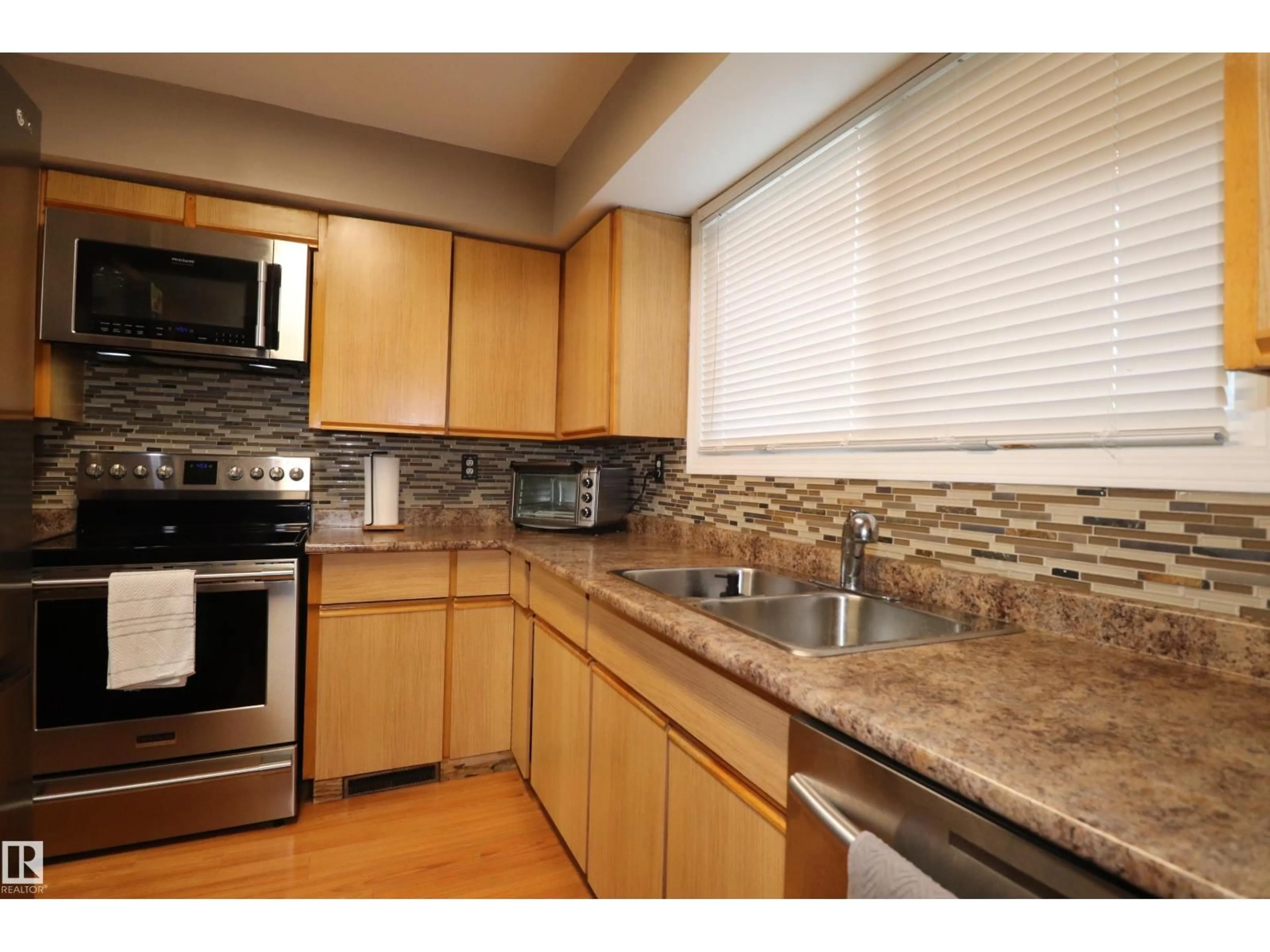 Standard kitchen, wood/laminate floor for #26 - 4610 17 AV NW, Edmonton Alberta T6L5T1