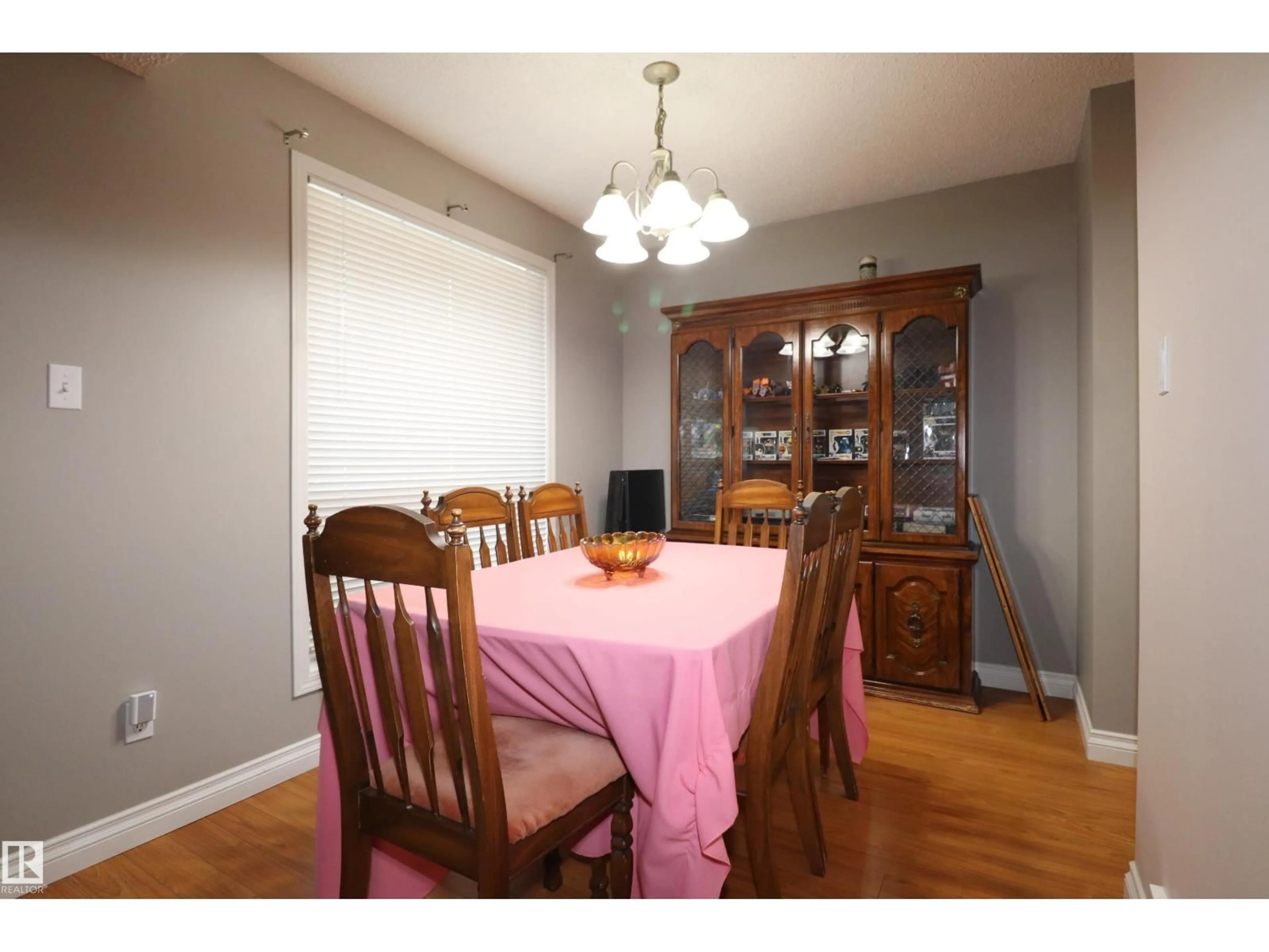 Dining room, wood/laminate floor for #26 - 4610 17 AV NW, Edmonton Alberta T6L5T1