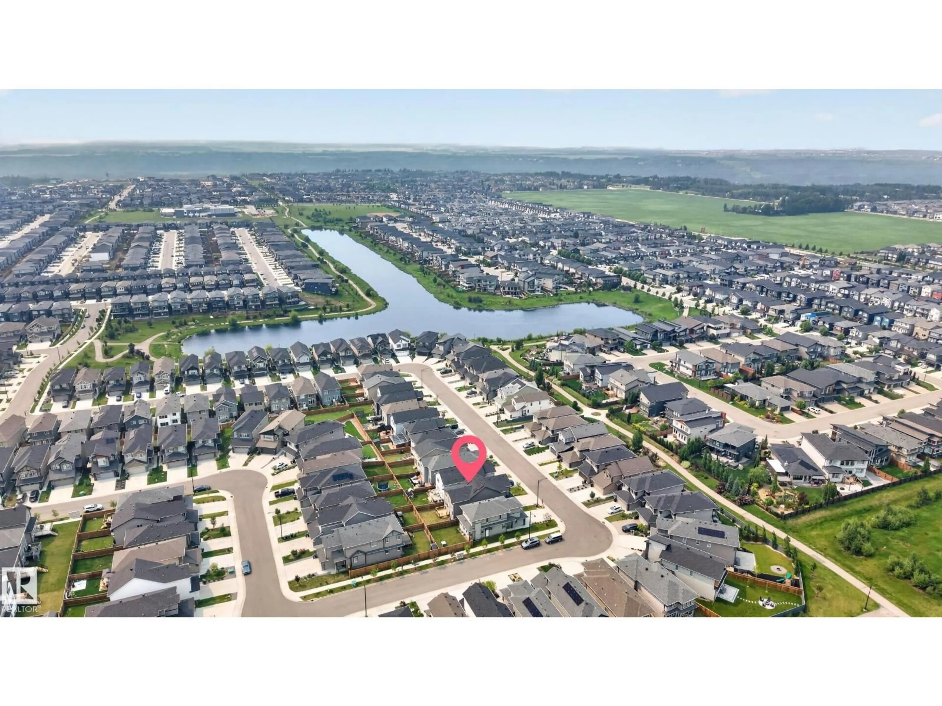 A pic from outside/outdoor area/front of a property/back of a property/a pic from drone, water/lake/river/ocean view for 4872 KINNEY RD RD, Edmonton Alberta T6W5G3