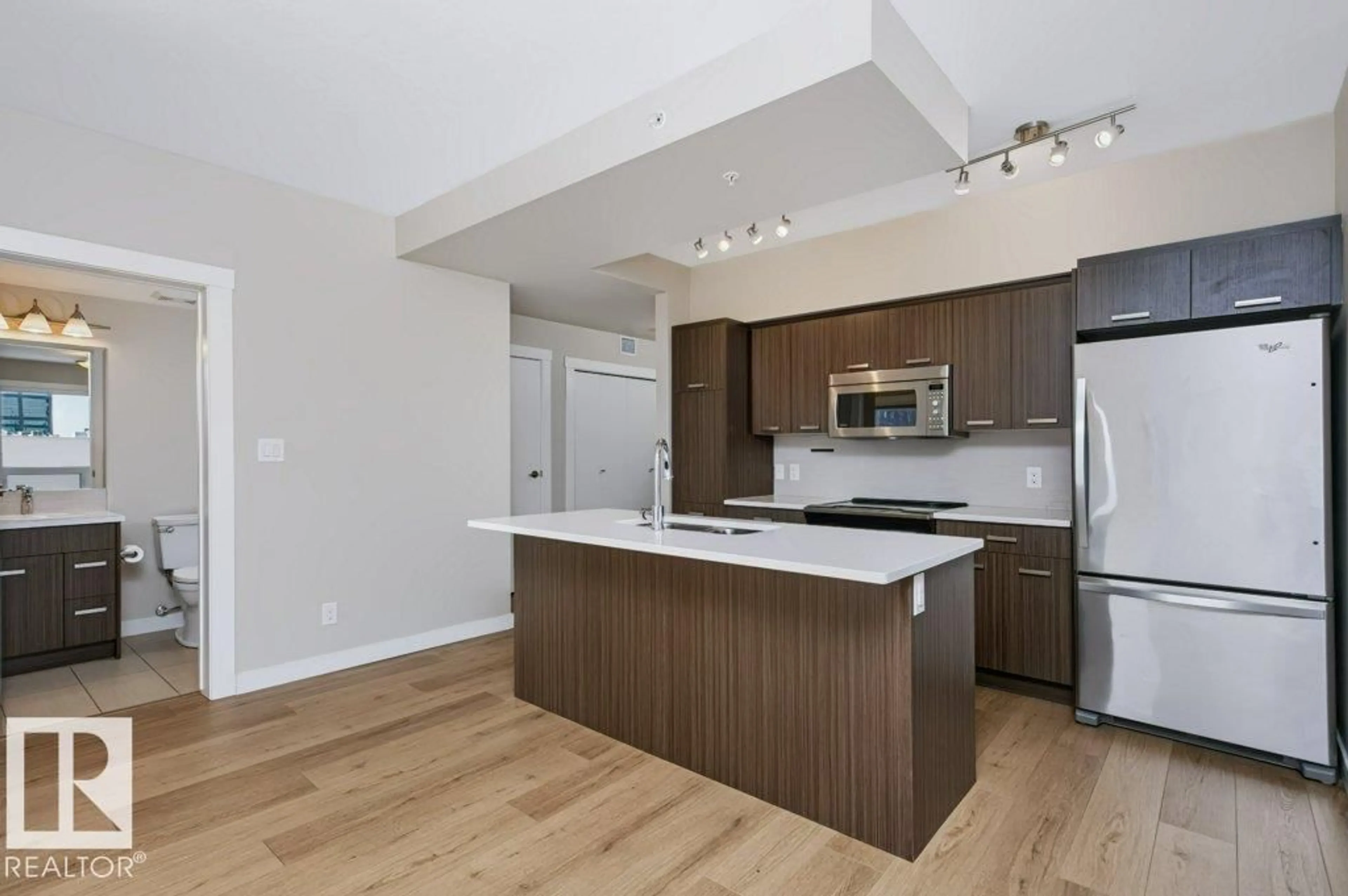 Open concept kitchen, unknown for #1002 - 10410 102 AV, Edmonton Alberta T5J0E9