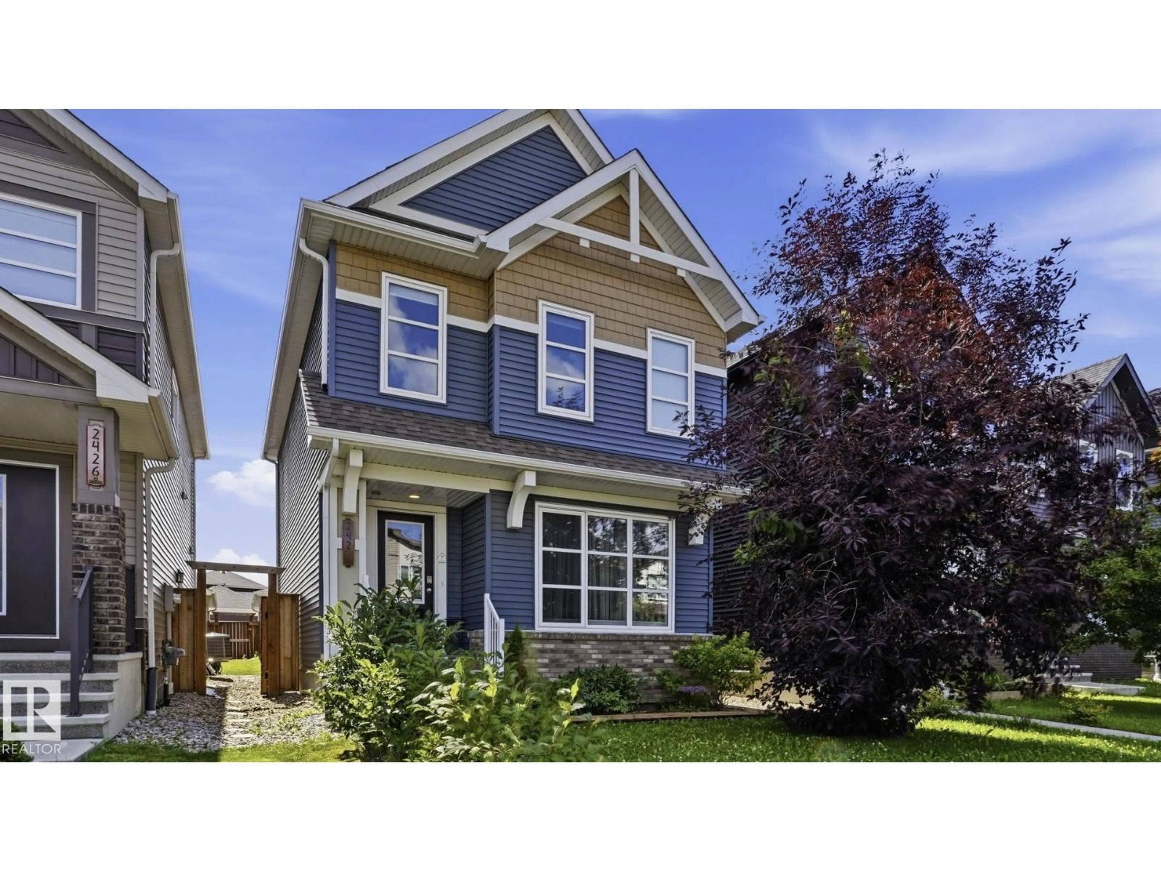 Home with vinyl exterior material, street for SW - 2424 CASEY LINK LI, Edmonton Alberta T6W3N2