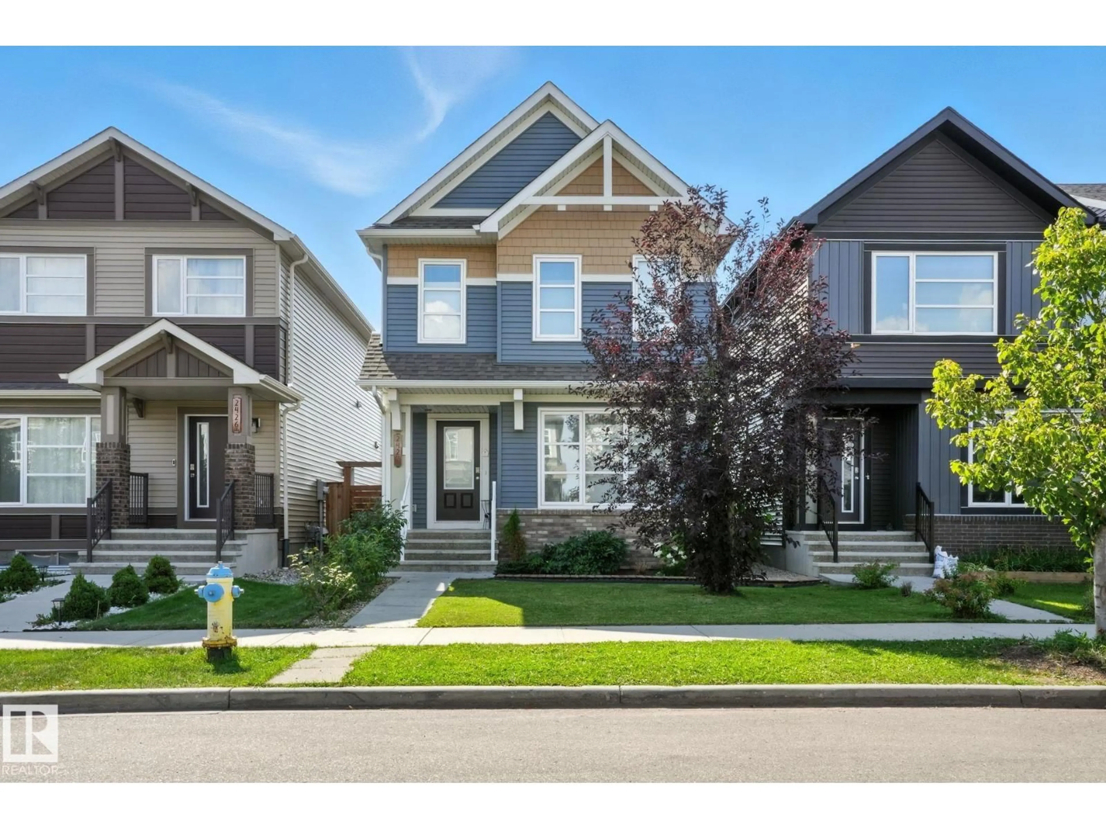 Home with vinyl exterior material, street for SW - 2424 CASEY LINK LI, Edmonton Alberta T6W3N2
