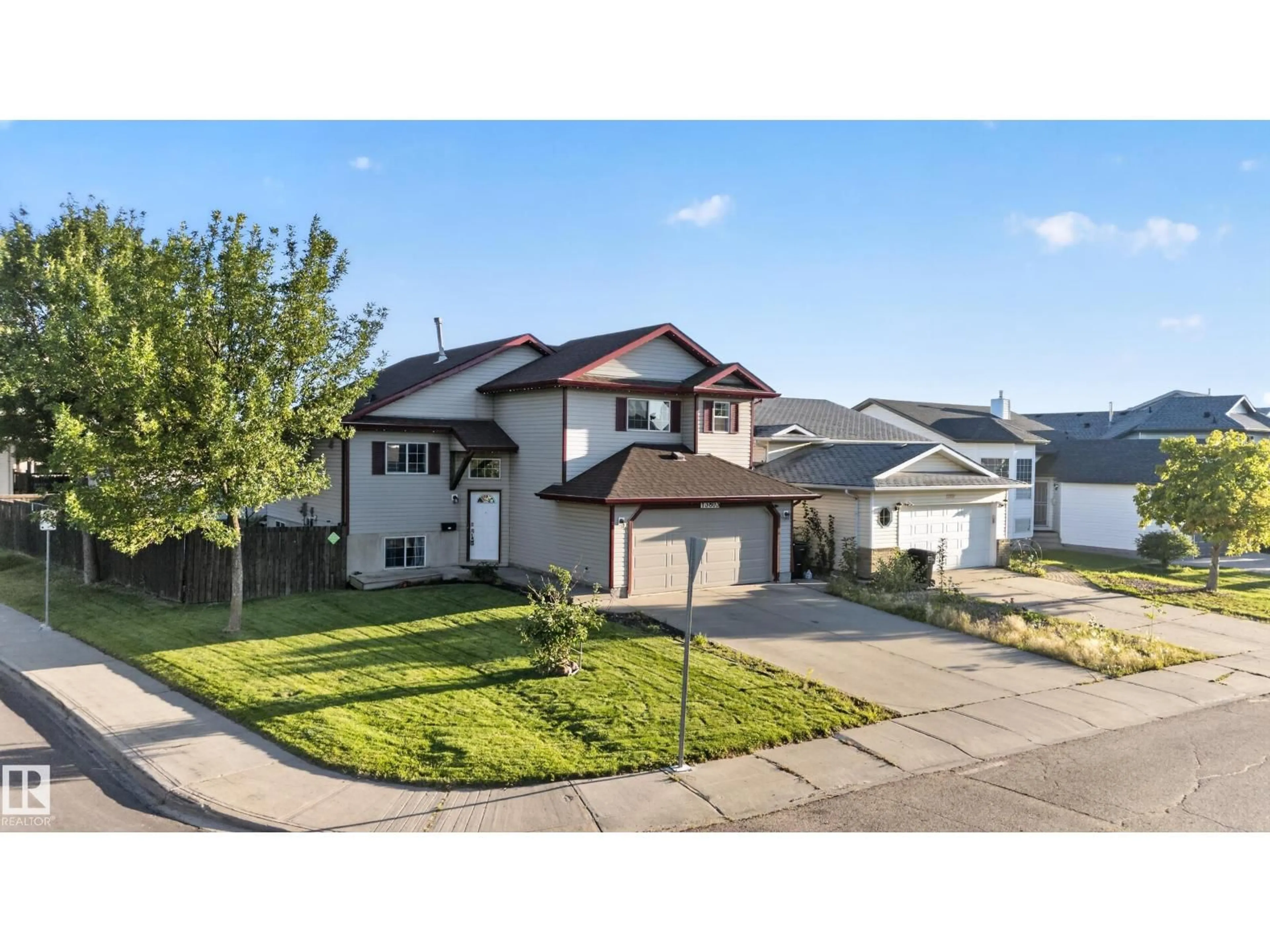 Home with vinyl exterior material, street for 13803 130A AV, Edmonton Alberta T5L5B8