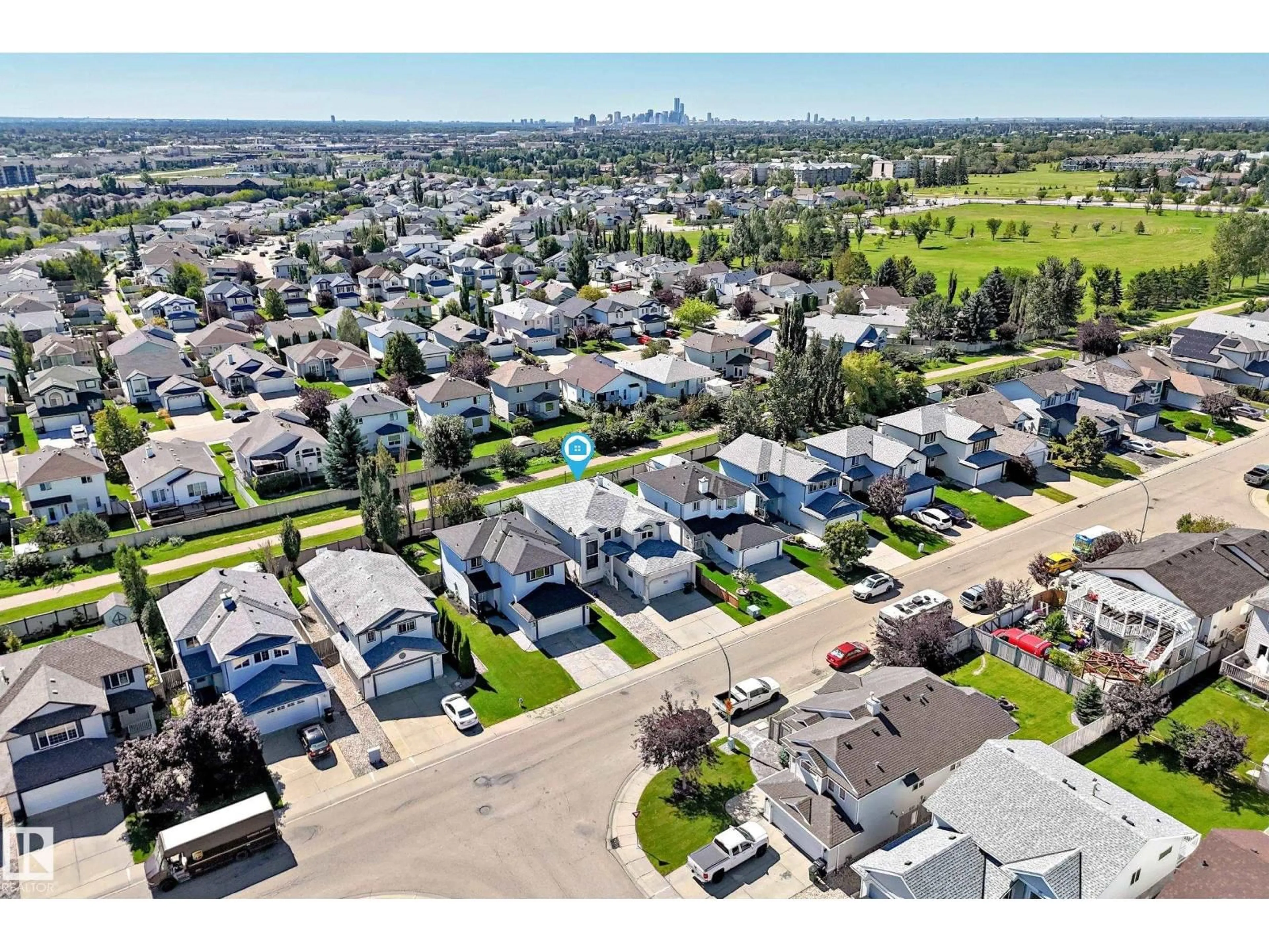 A pic from outside/outdoor area/front of a property/back of a property/a pic from drone, street for 4711 152 AV, Edmonton Alberta T5Y3B7