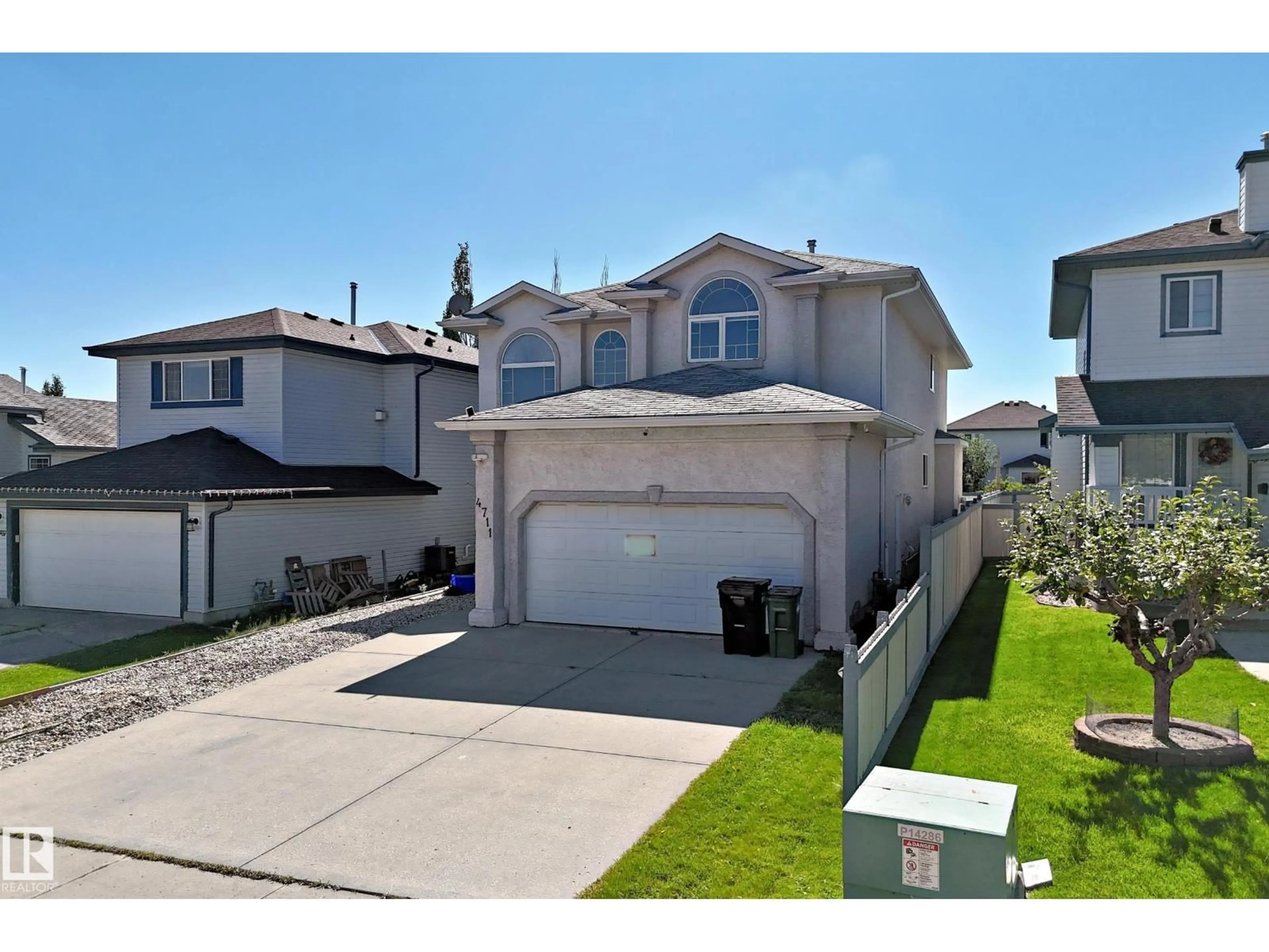 A pic from outside/outdoor area/front of a property/back of a property/a pic from drone, street for 4711 152 AV, Edmonton Alberta T5Y3B7