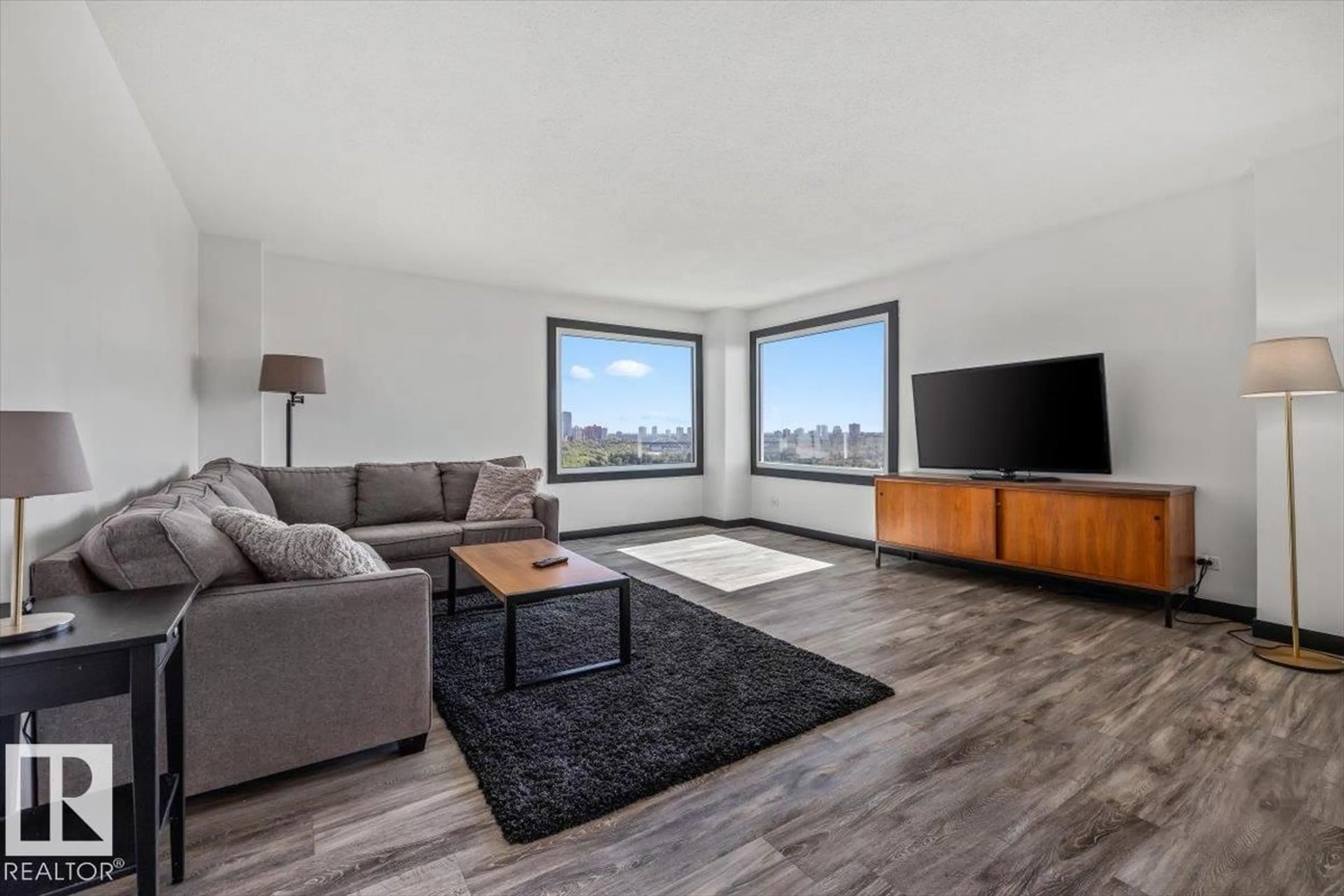 Living room with furniture, wood/laminate floor for 906 12303 JASPER AV NW, Edmonton Alberta T5N3K7