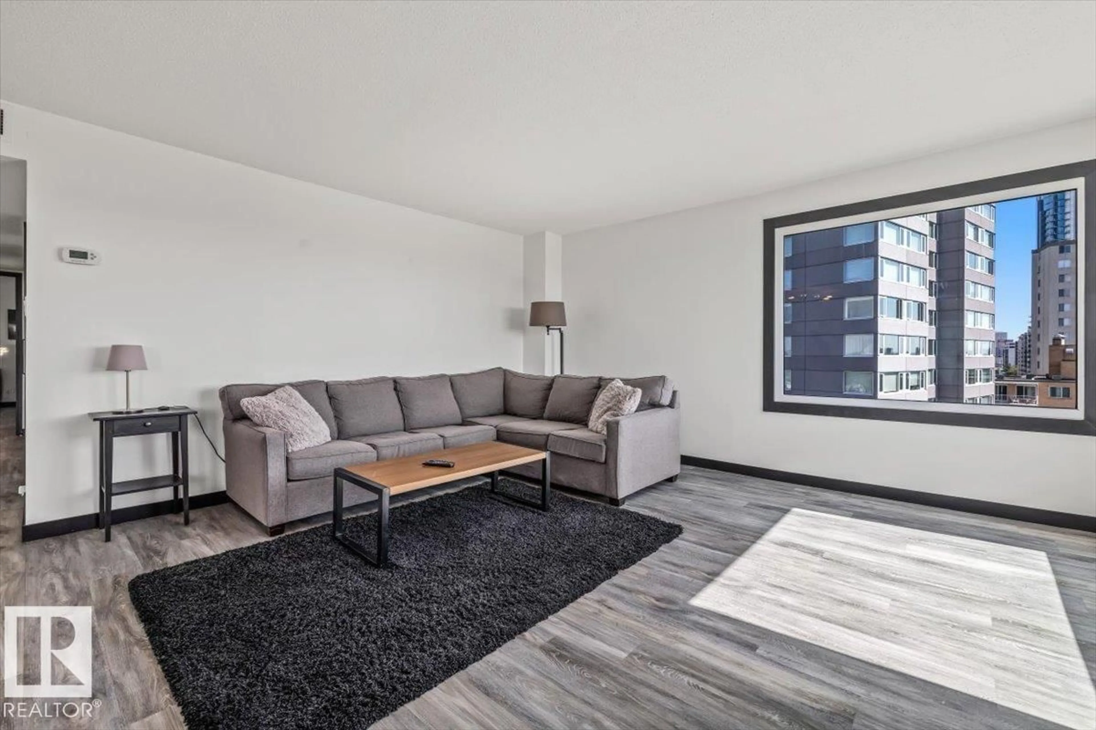 Living room with furniture, unknown for 906 12303 JASPER AV NW, Edmonton Alberta T5N3K7