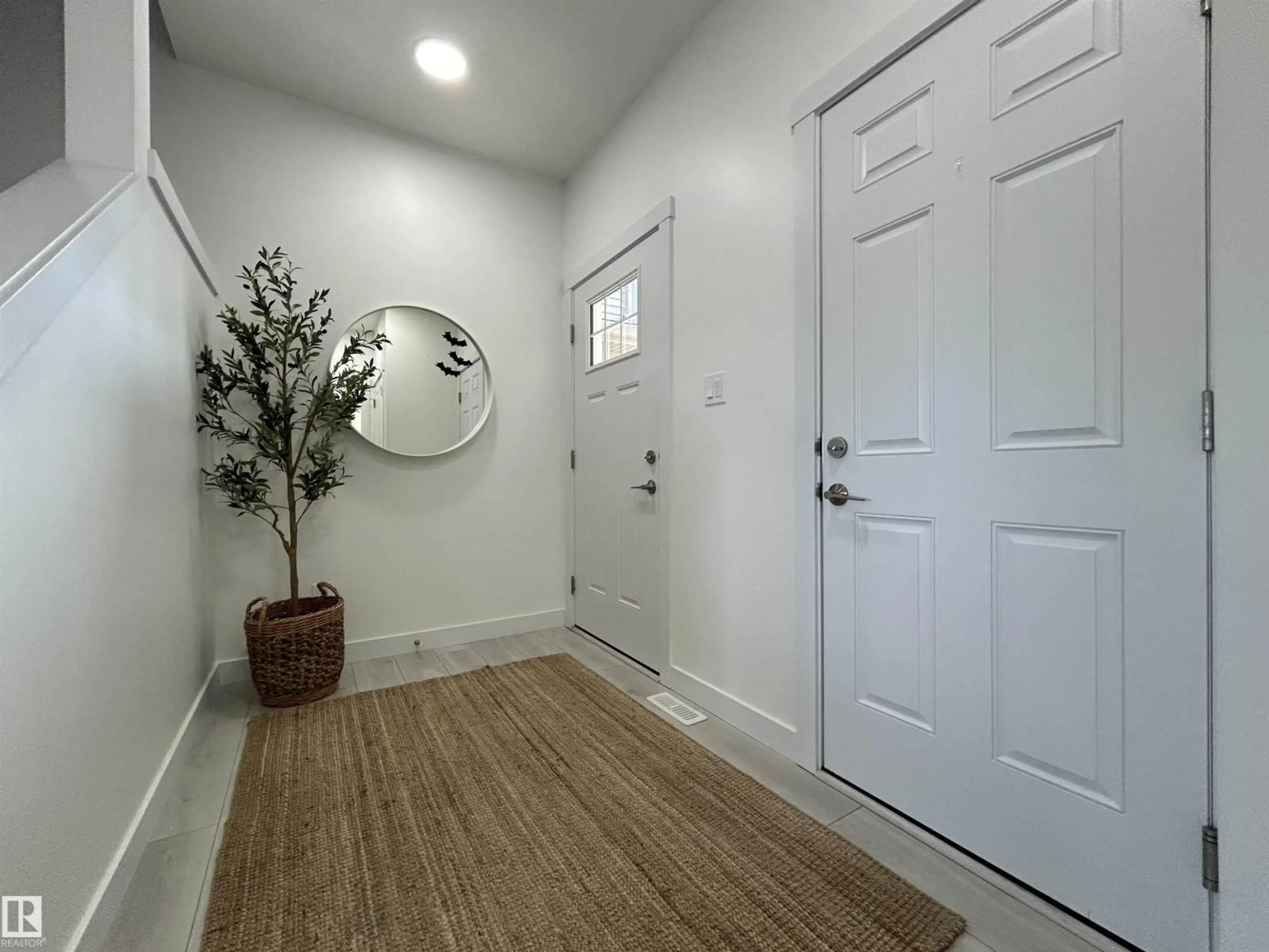 Indoor entryway for 19728 29 AV, Edmonton Alberta T6M1M2