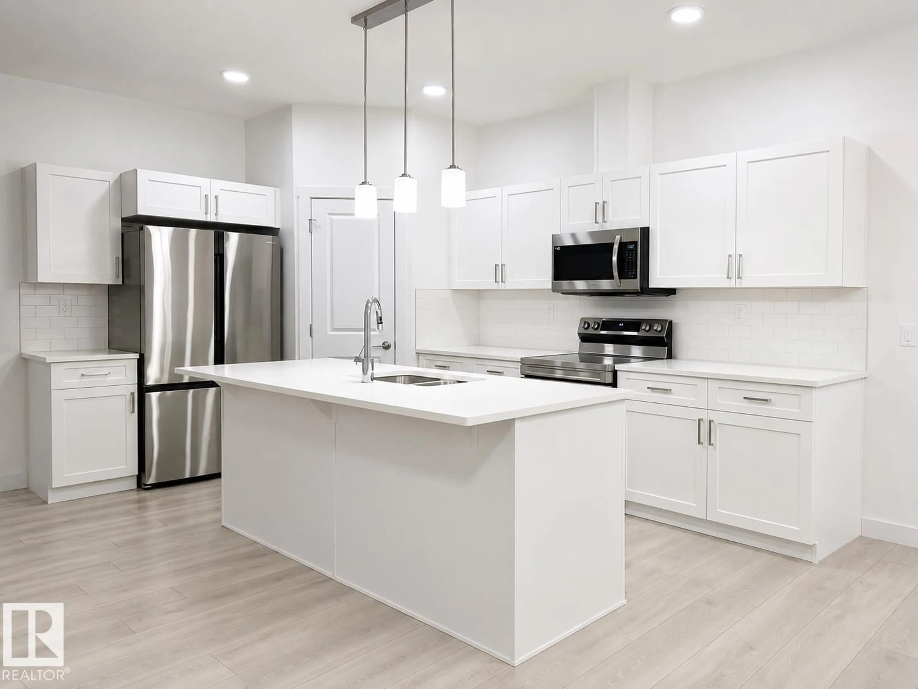 Open concept kitchen, unknown for 19728 29 AV, Edmonton Alberta T6M1M2