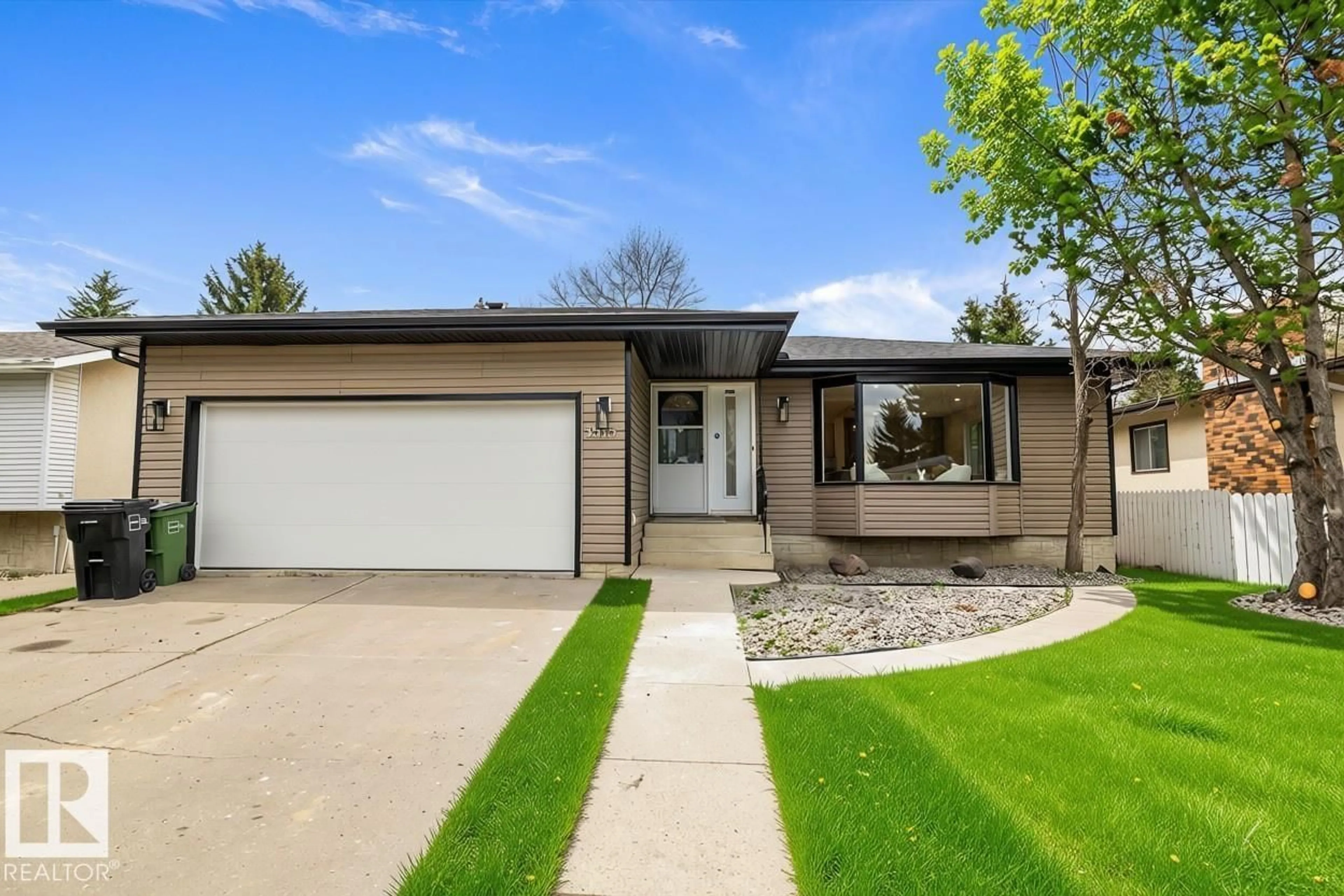 Home with vinyl exterior material, street for NW - 3515 105B ST, Edmonton Alberta T6H2K9
