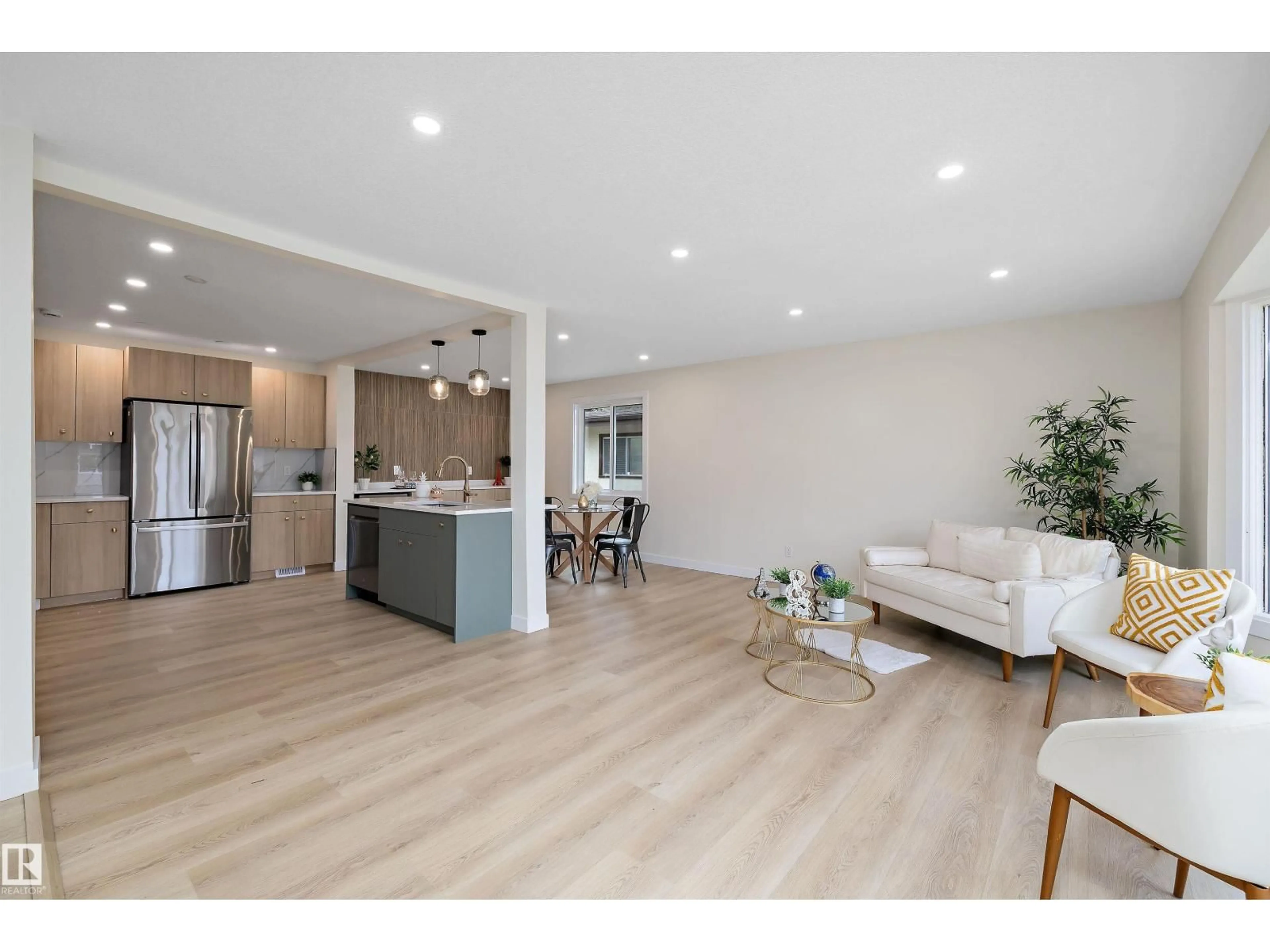 Open concept kitchen, wood/laminate floor for NW - 3515 105B ST, Edmonton Alberta T6H2K9