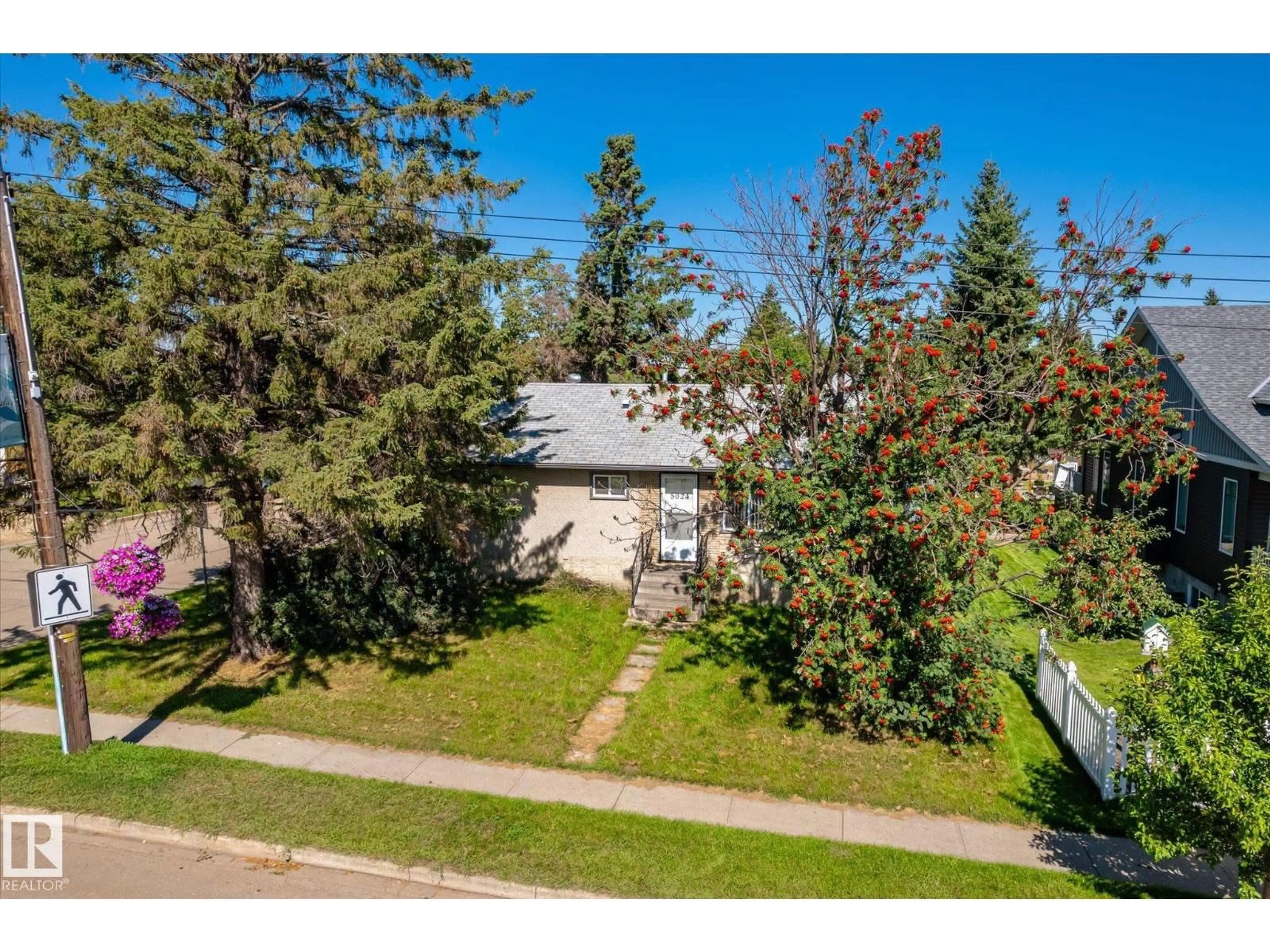 A pic from outside/outdoor area/front of a property/back of a property/a pic from drone, street for 5024 50 AV, Legal Alberta T0G1L0