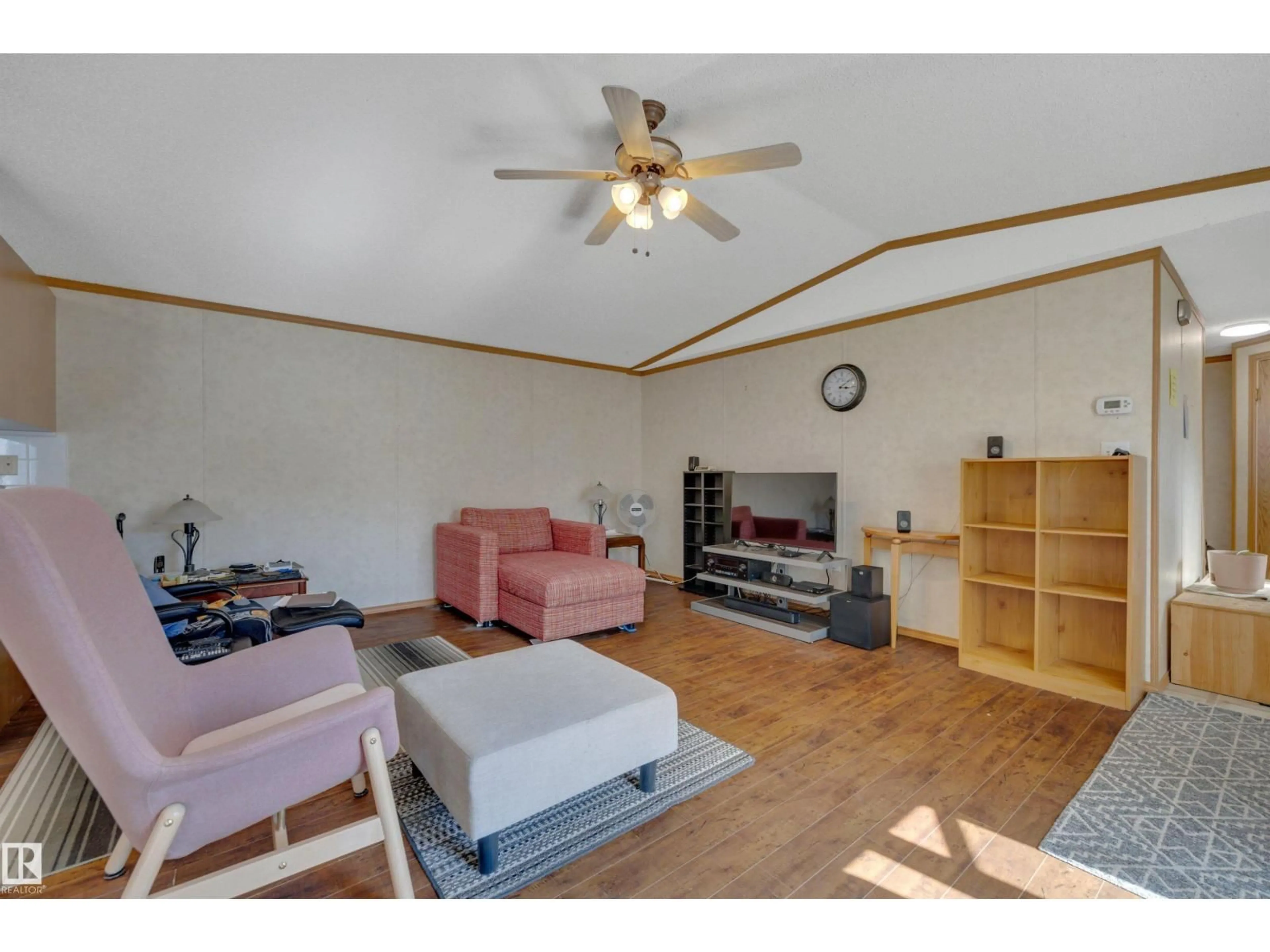 Living room with furniture, wood/laminate floor for 17 WILLOW PARK ESTATES, Leduc Alberta T9E5P7