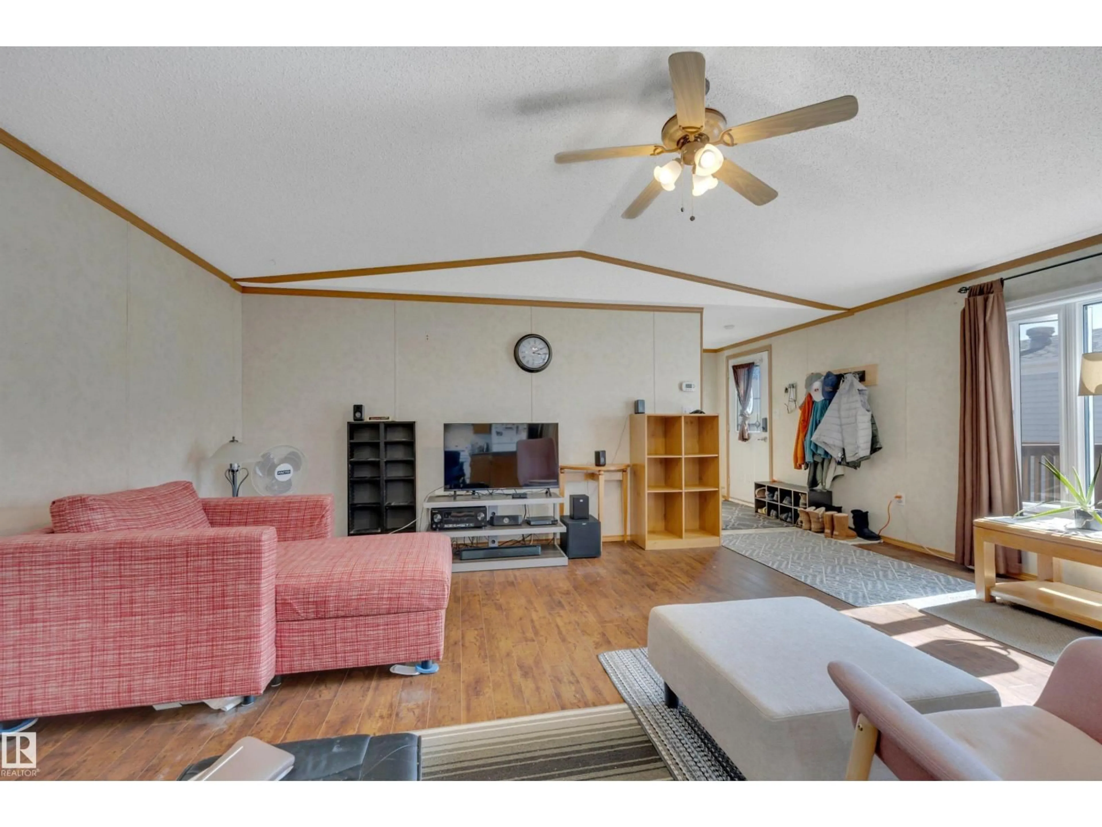 Living room with furniture, wood/laminate floor for 17 WILLOW PARK ESTATES, Leduc Alberta T9E5P7