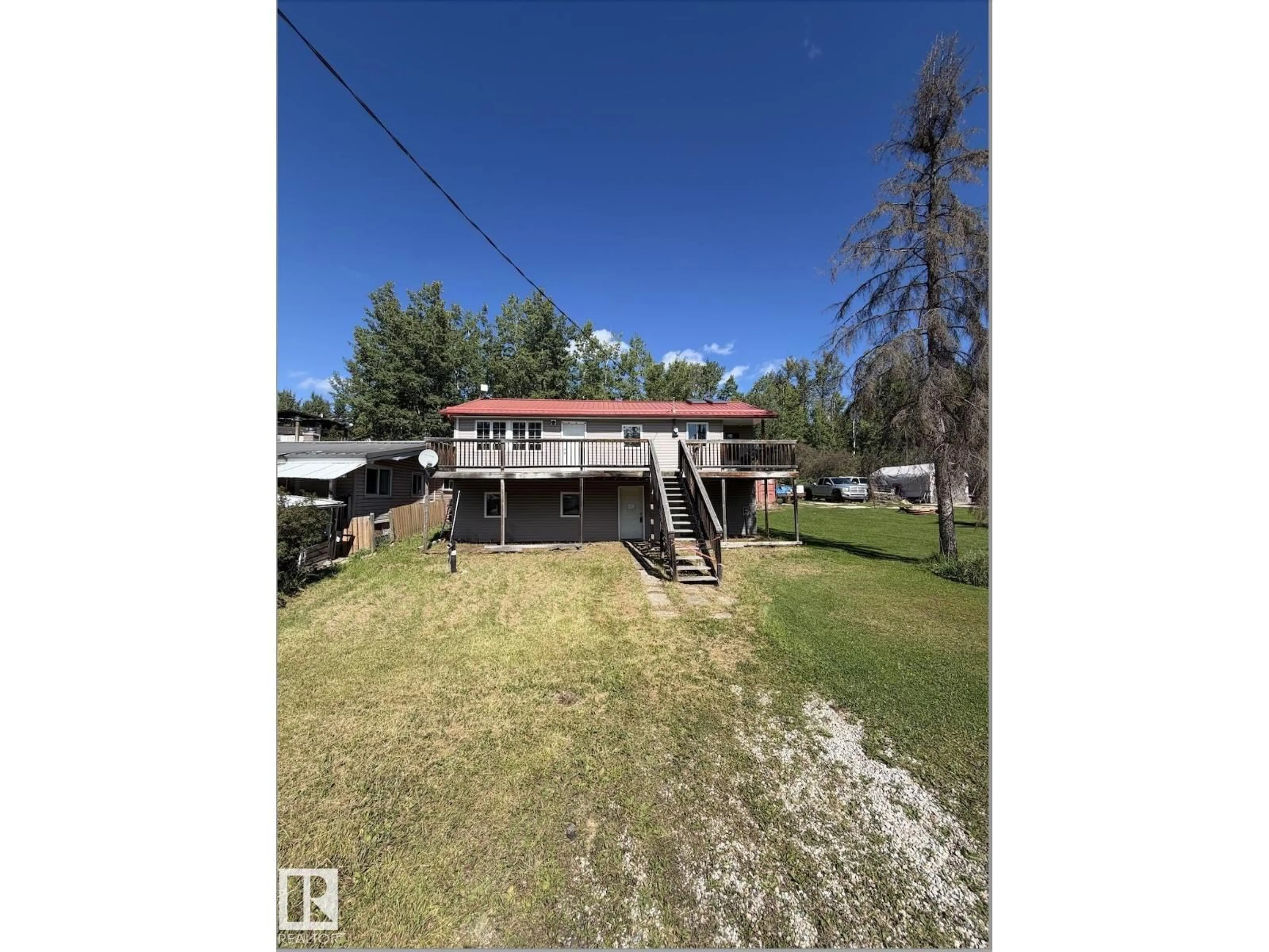 A pic from outside/outdoor area/front of a property/back of a property/a pic from drone, unknown for 9914 101 AV, Rural Lac Ste. Anne County Alberta T0E0L0