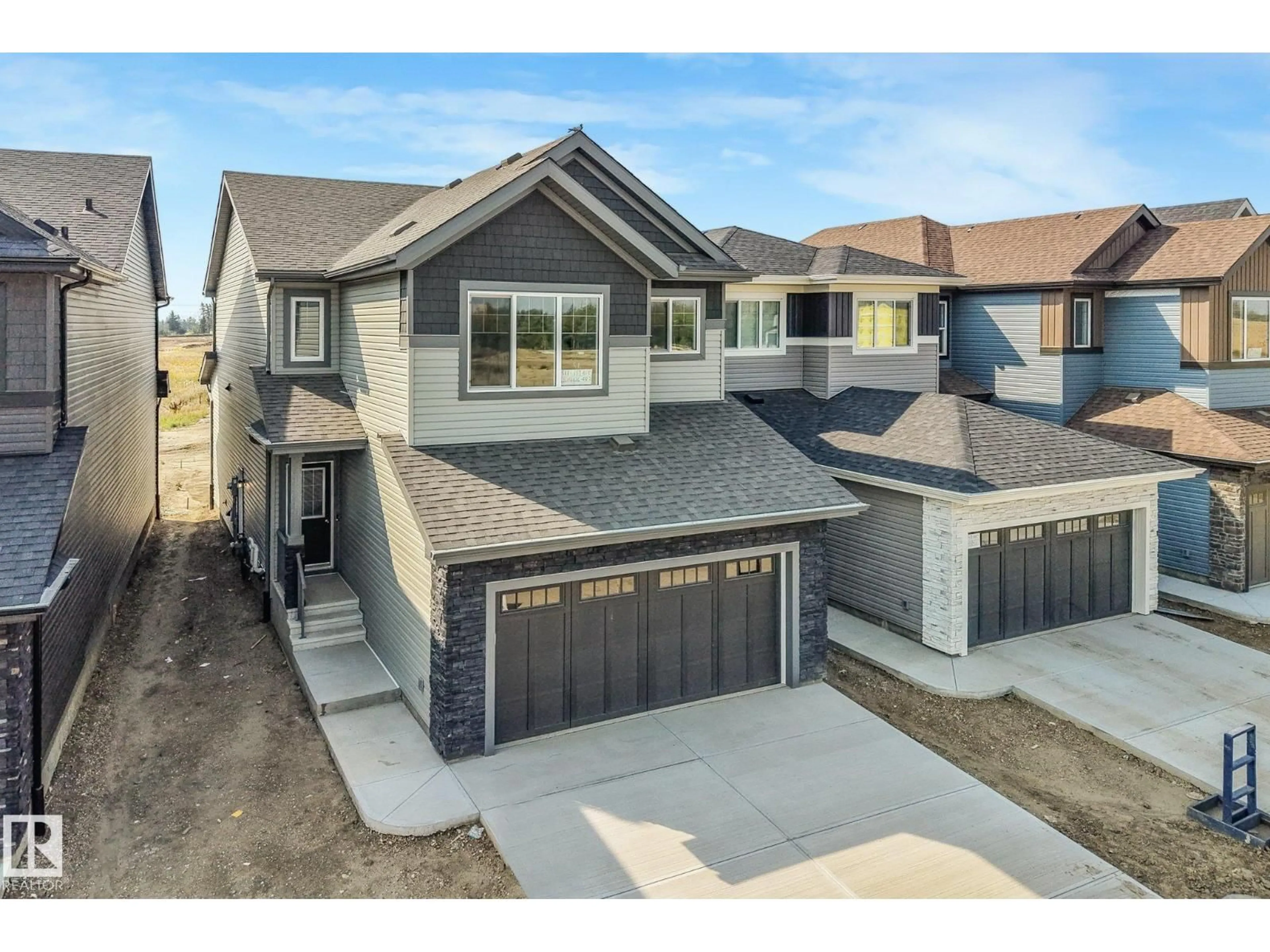 Home with brick exterior material, street for NE - 511 157 AV, Edmonton Alberta T5Y4N2