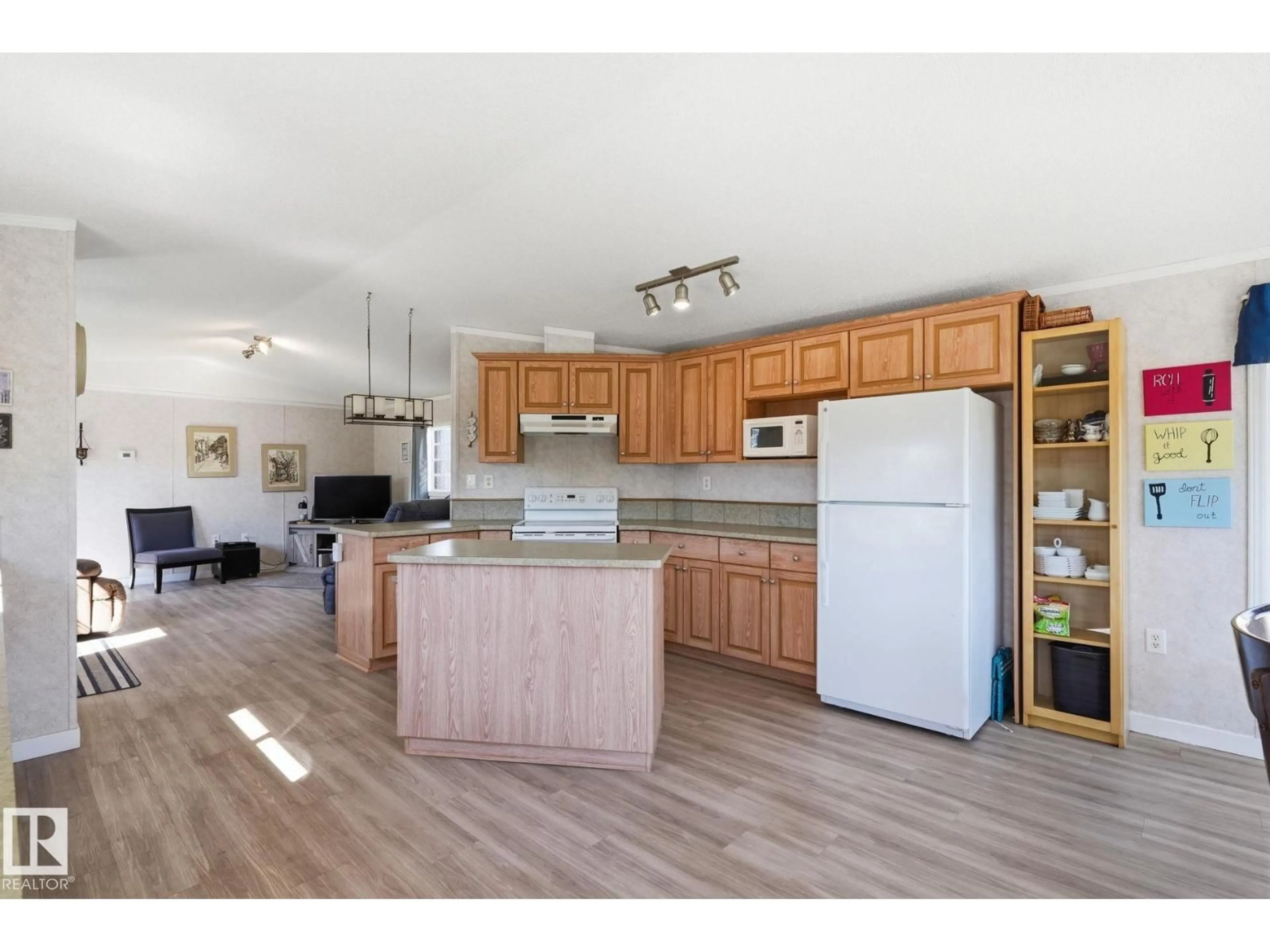 Open concept kitchen, wood/laminate floor for 234 OAK WOOD DR, Edmonton Alberta T6P0A3