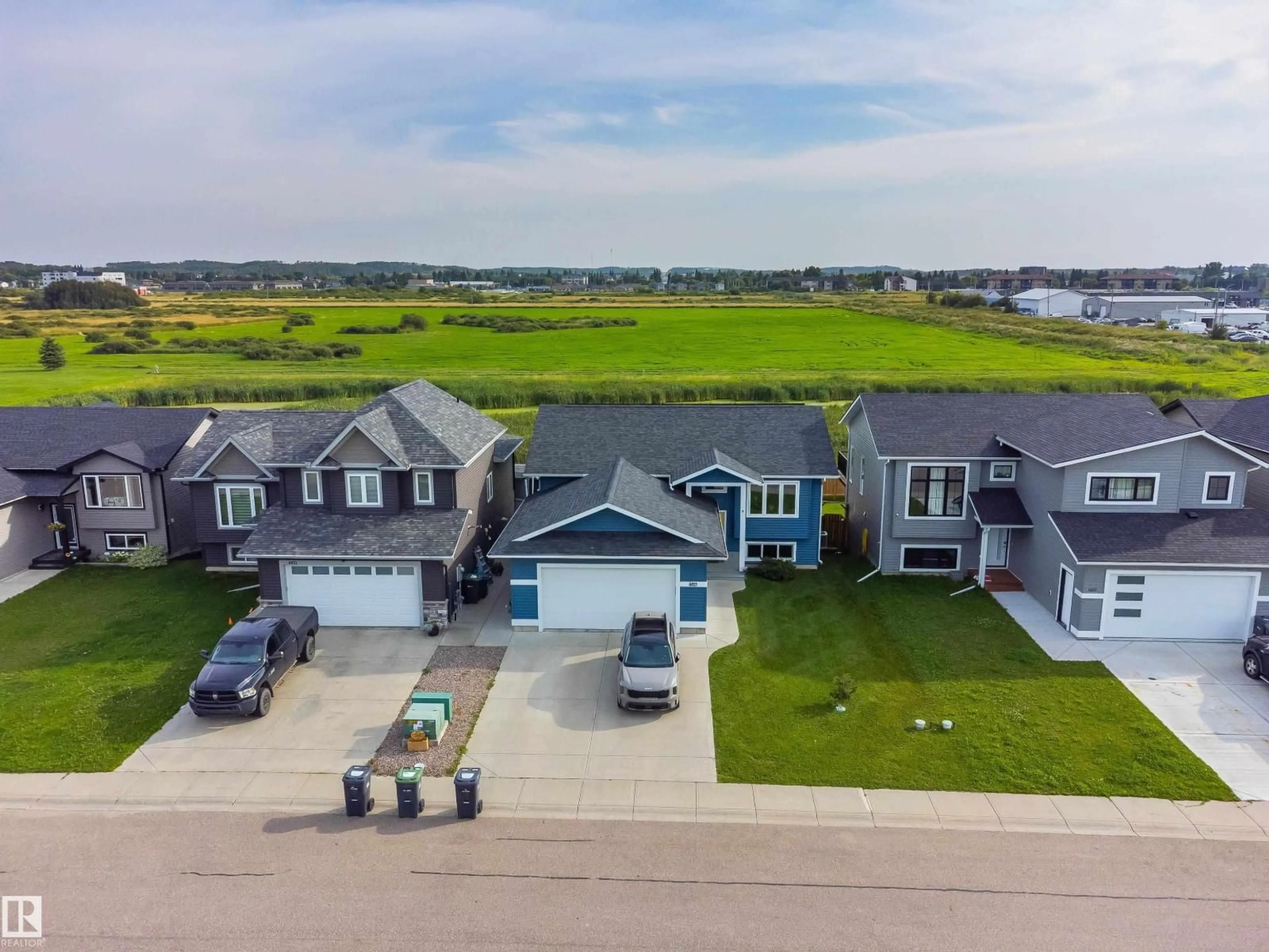 A pic from outside/outdoor area/front of a property/back of a property/a pic from drone, water/lake/river/ocean view for 4927 57 AV, Cold Lake Alberta T9M0E7