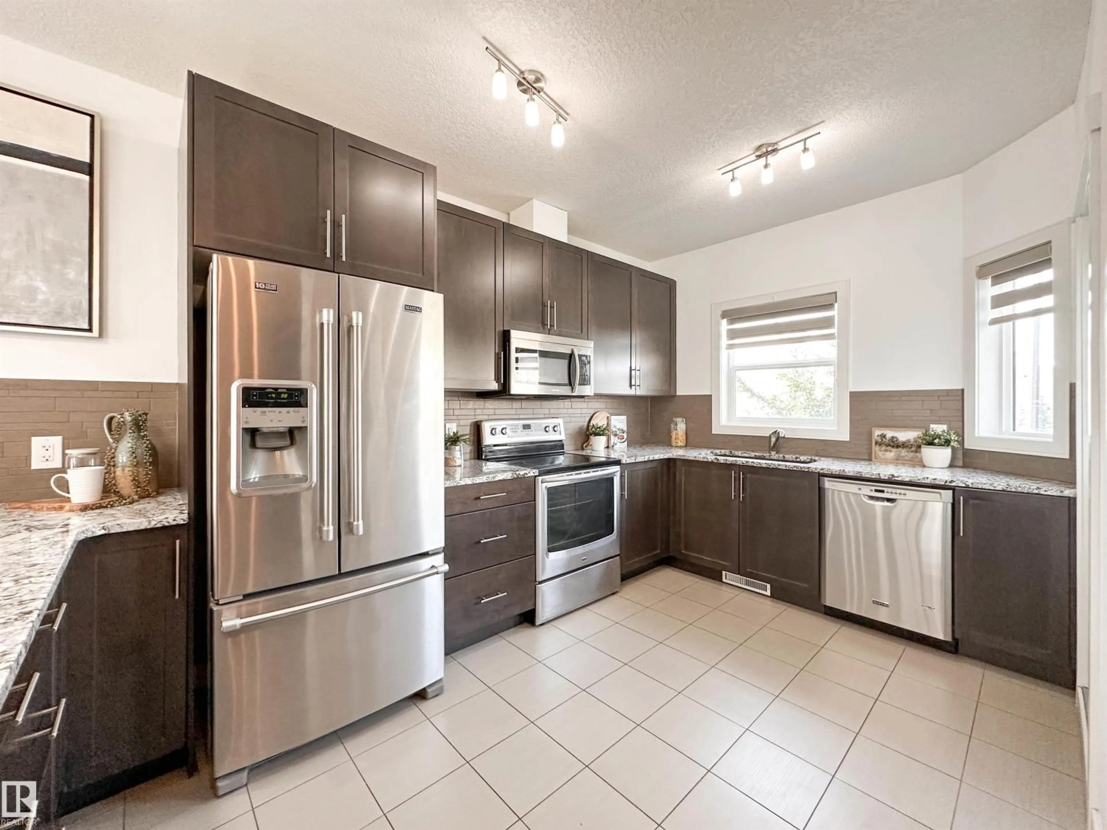 Open concept kitchen, ceramic/tile floor for #11 - 150 EVERITT DR, St. Albert Alberta T8N7R8