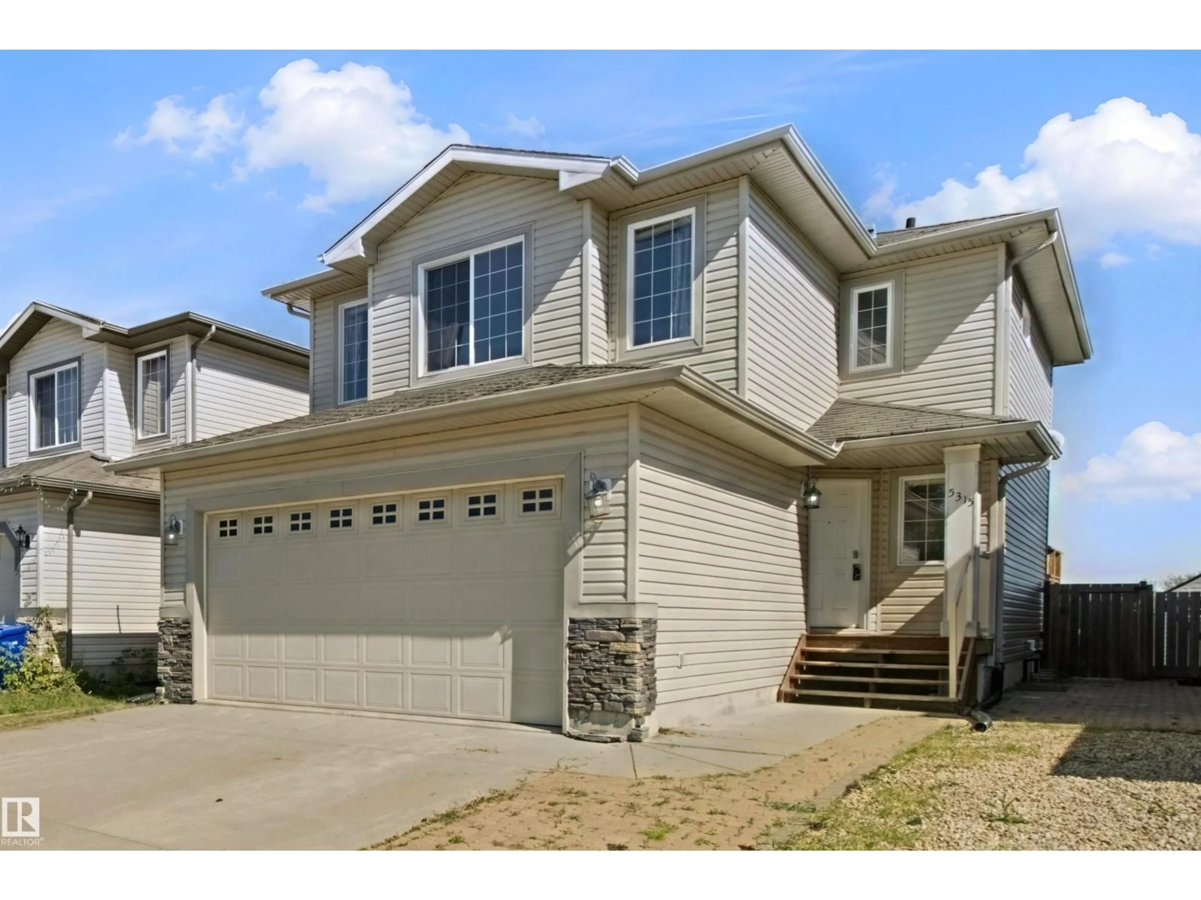 Home with vinyl exterior material, street for 5315 45 ST, Bruderheim Alberta T0B0S0