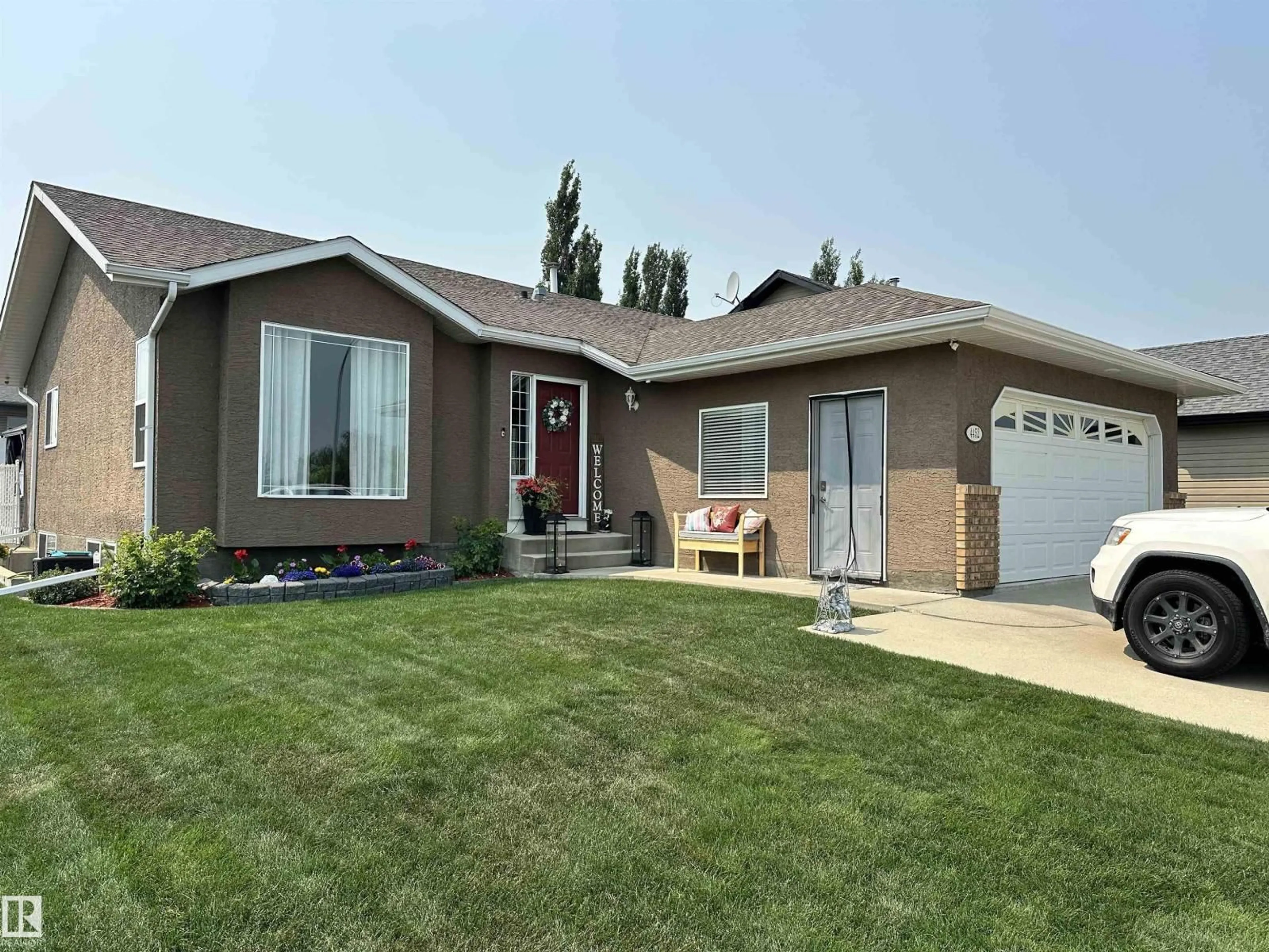 Home with vinyl exterior material, street for 4452 40 ST, Drayton Valley Alberta T7A1V9