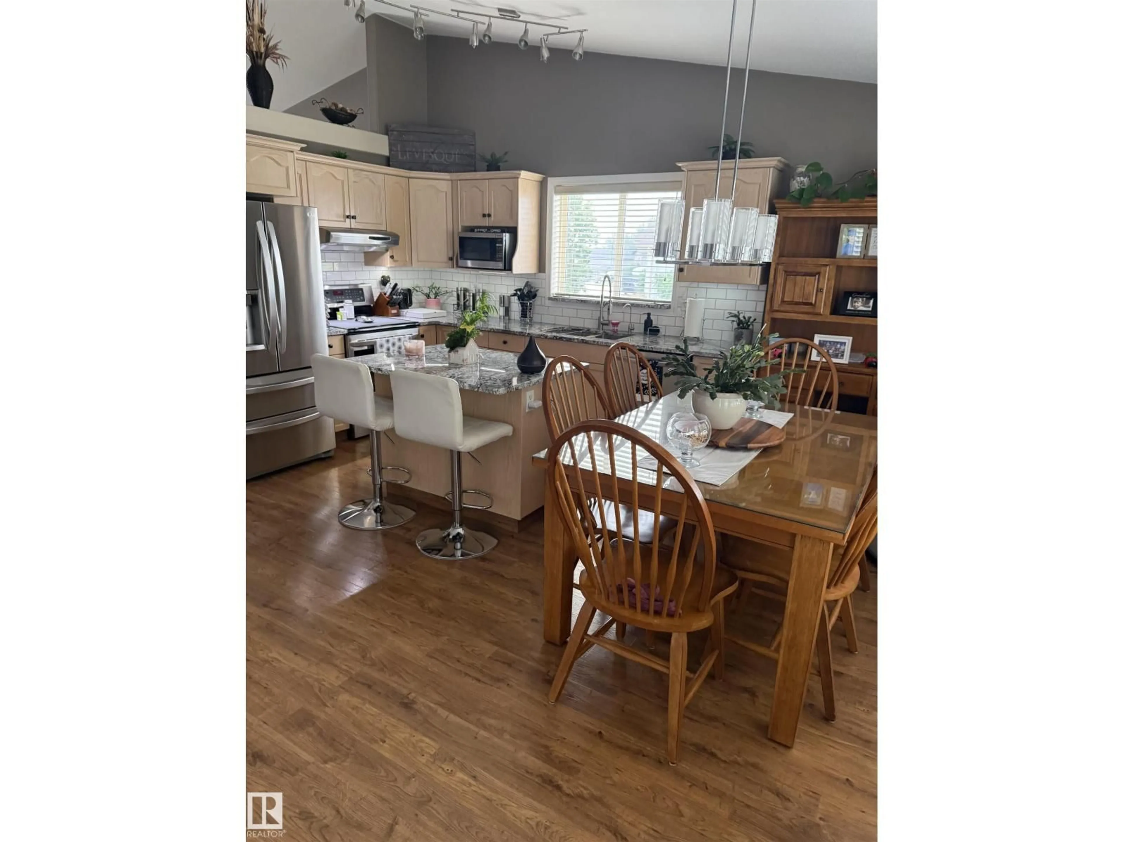 Open concept kitchen, wood/laminate floor for 4452 40 ST, Drayton Valley Alberta T7A1V9