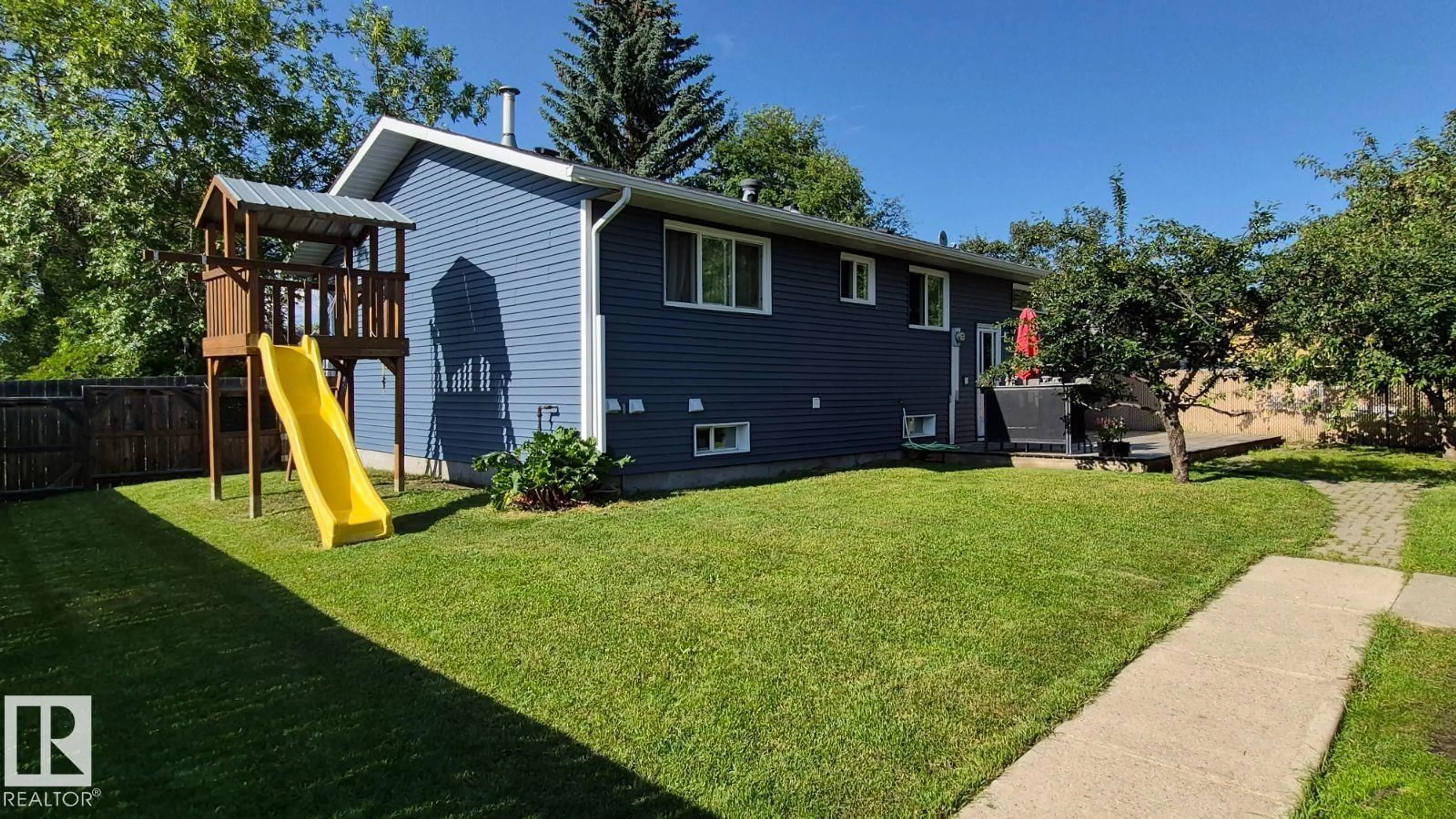Home with vinyl exterior material, street for 5201 56A ST, Beaumont Alberta T4X1B4