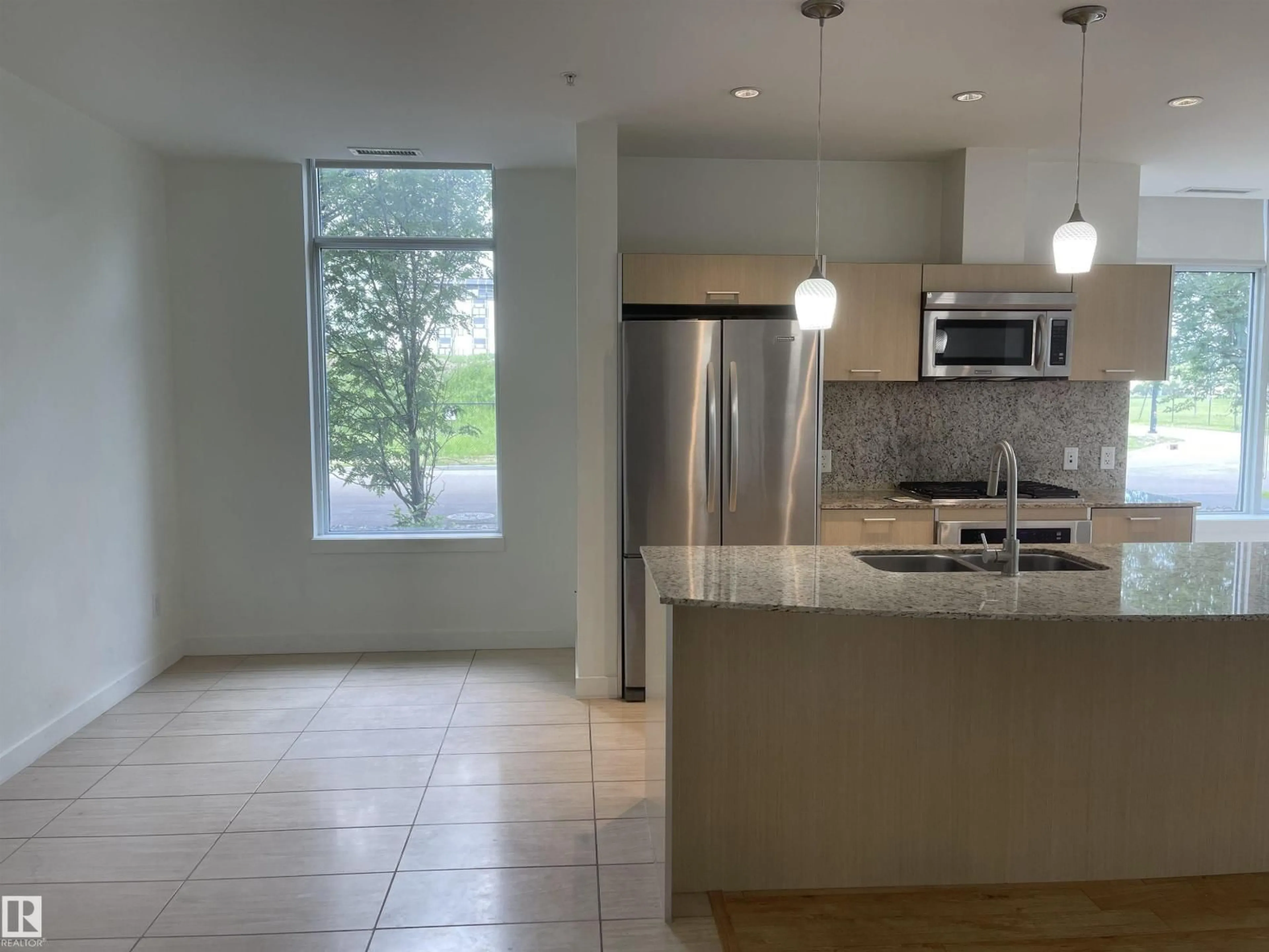 Open concept kitchen, ceramic/tile floor for #113 - 2510 109 ST, Edmonton Alberta T6J2X1