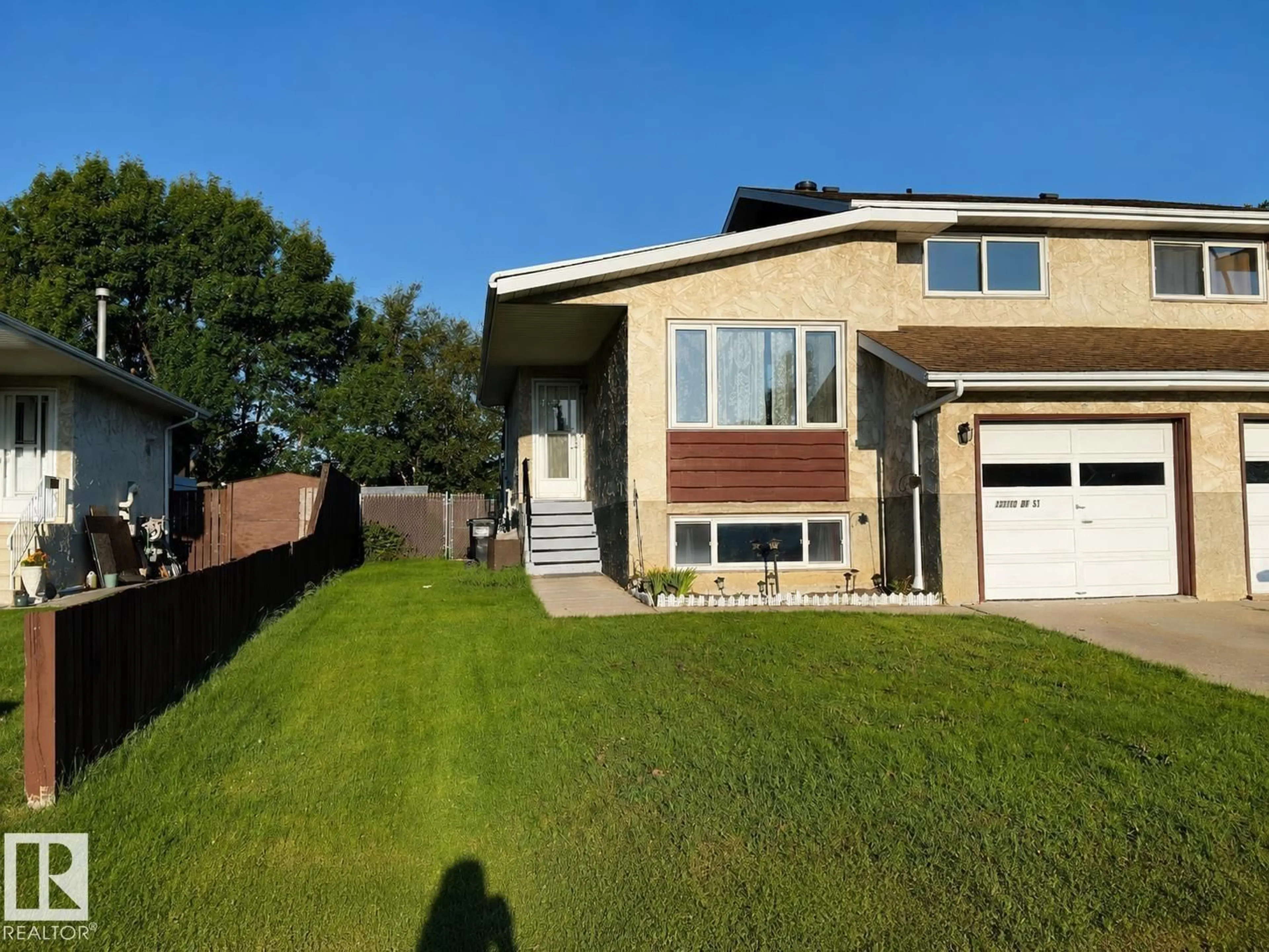 Home with vinyl exterior material, street for 13110 31 ST, Edmonton Alberta T5A3A4