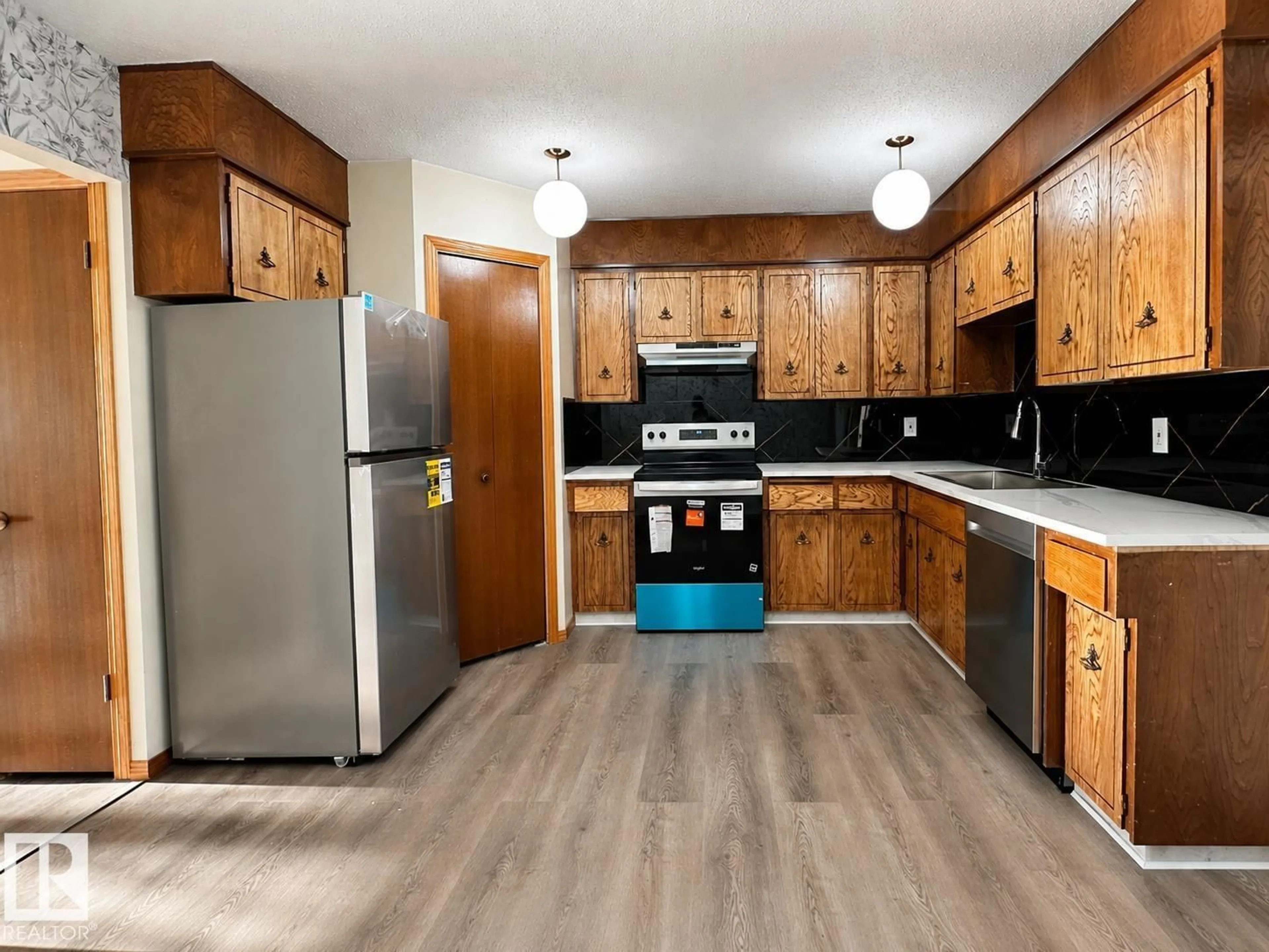 Standard kitchen, wood/laminate floor for 13110 31 ST, Edmonton Alberta T5A3A4