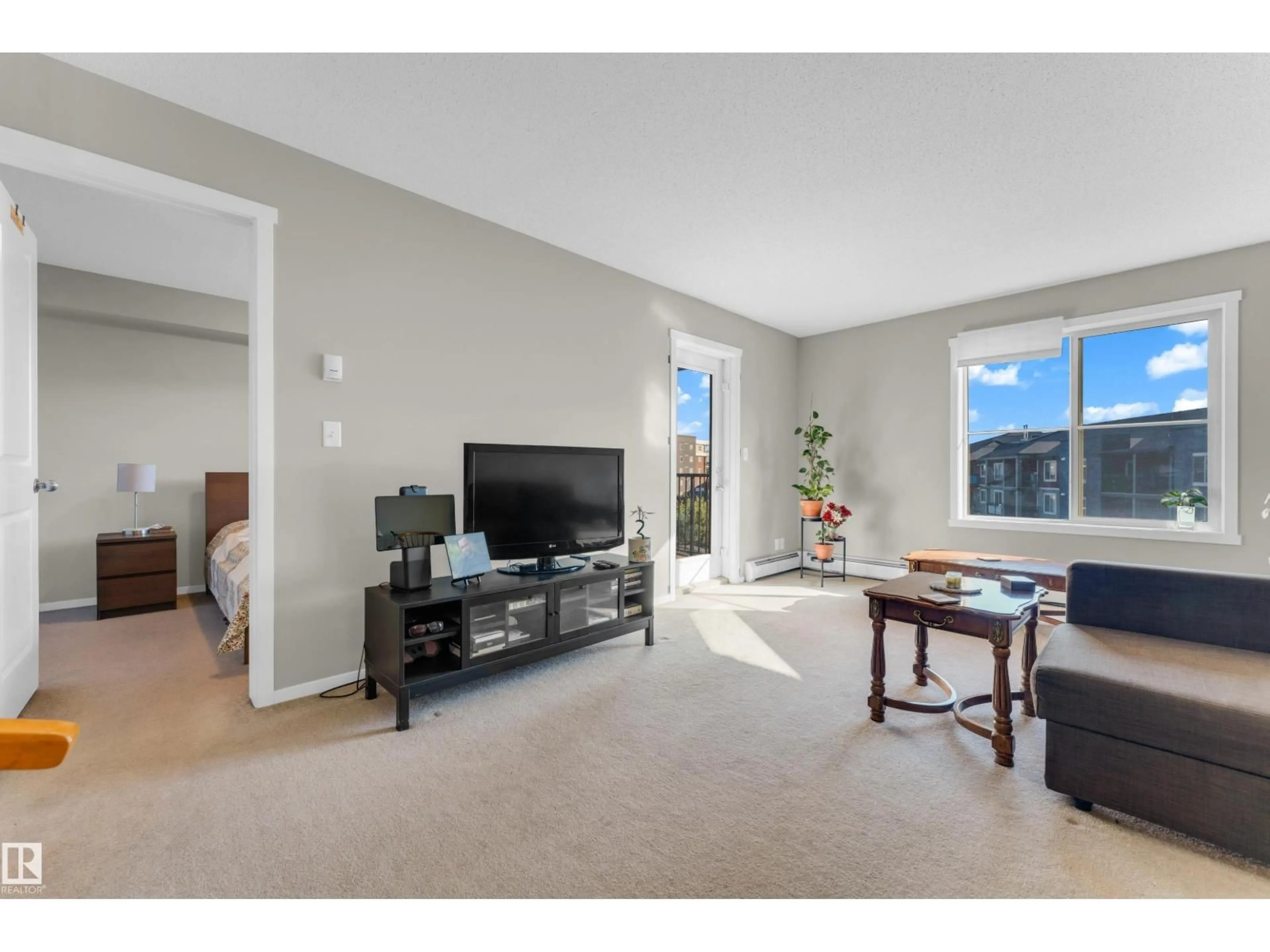 Living room with furniture, unknown for 430 - 3315 JAMES MOWATT TR, Edmonton Alberta T6W3L9