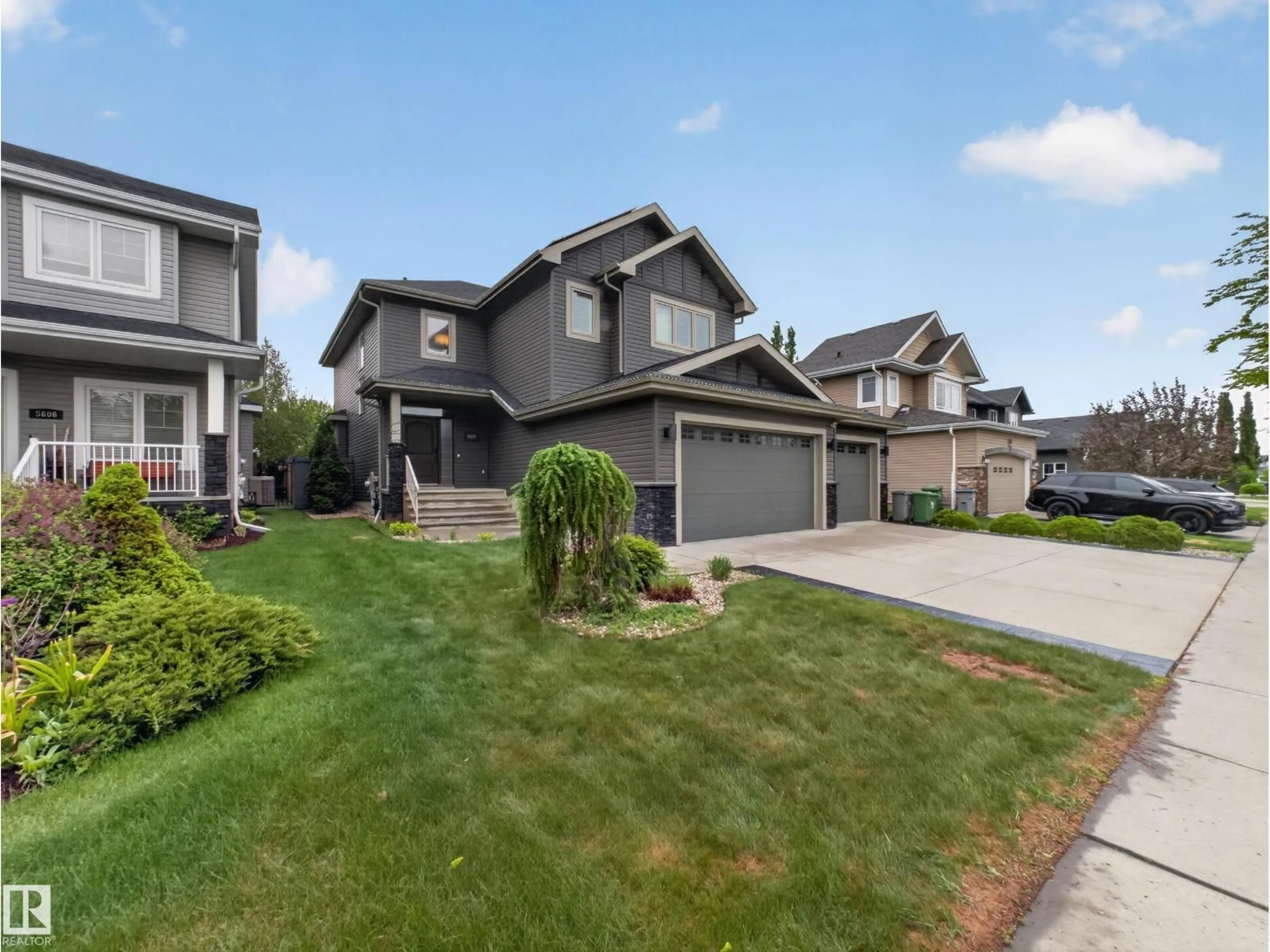 Home with vinyl exterior material, street for 5608 SOLEIL BV, Beaumont Alberta T4X0E1
