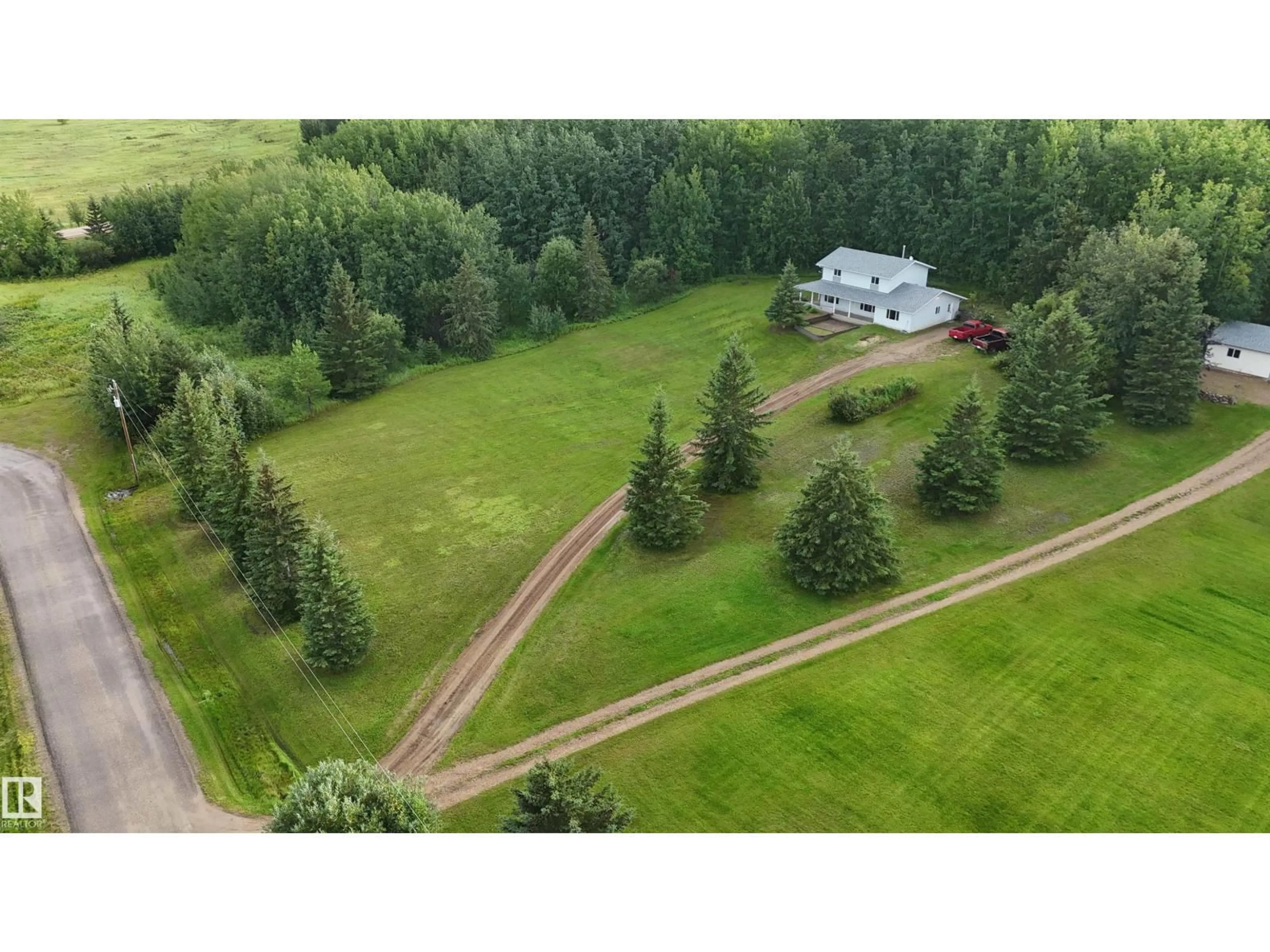 A pic from outside/outdoor area/front of a property/back of a property/a pic from drone, forest/trees view for 85 660007 RGE ROAD 224, Athabasca Town Alberta T9S1B4