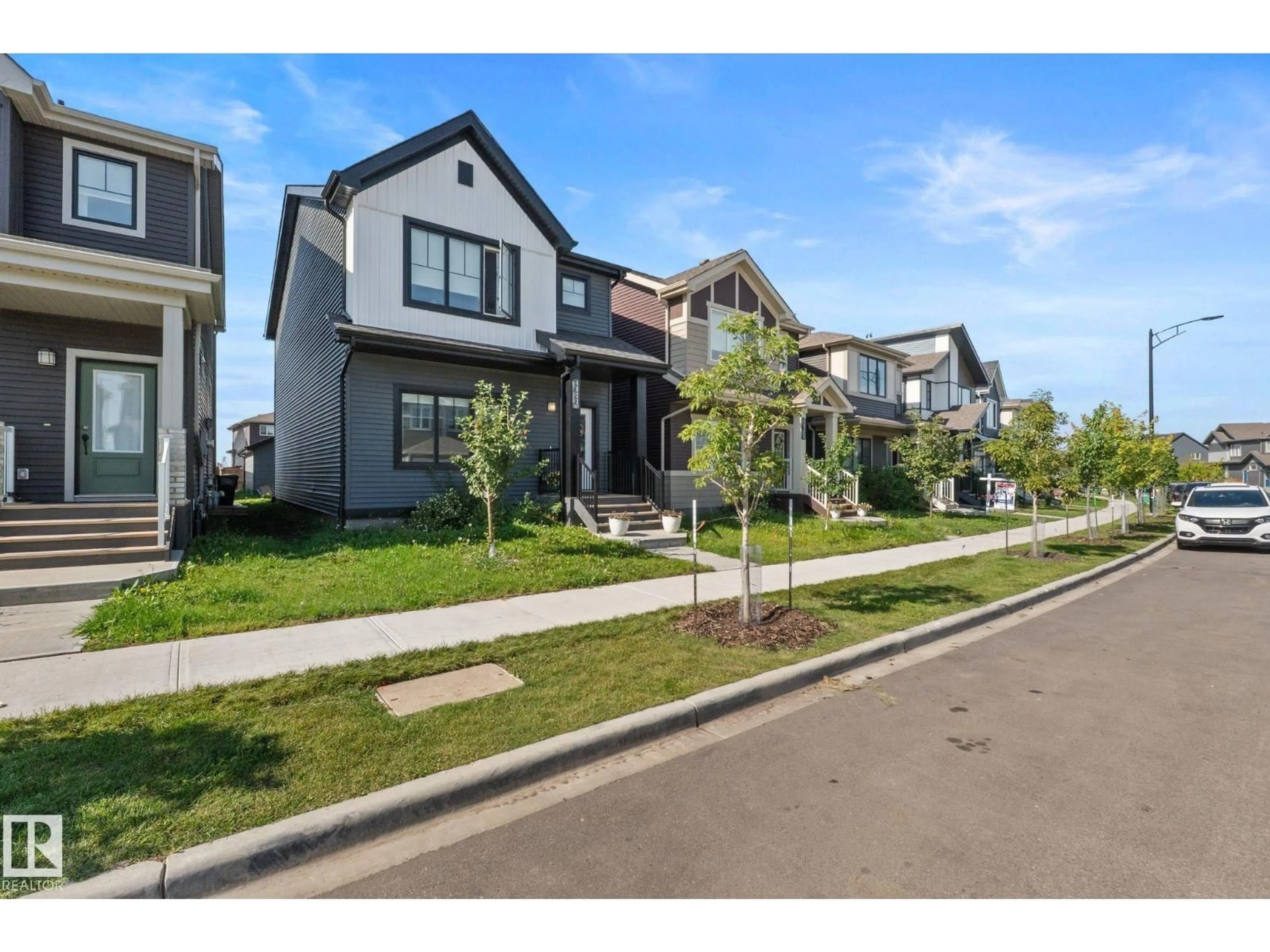 Home with vinyl exterior material, street for LI SW - 4023 HAWTHORN LINK, Edmonton Alberta T6X1Y6