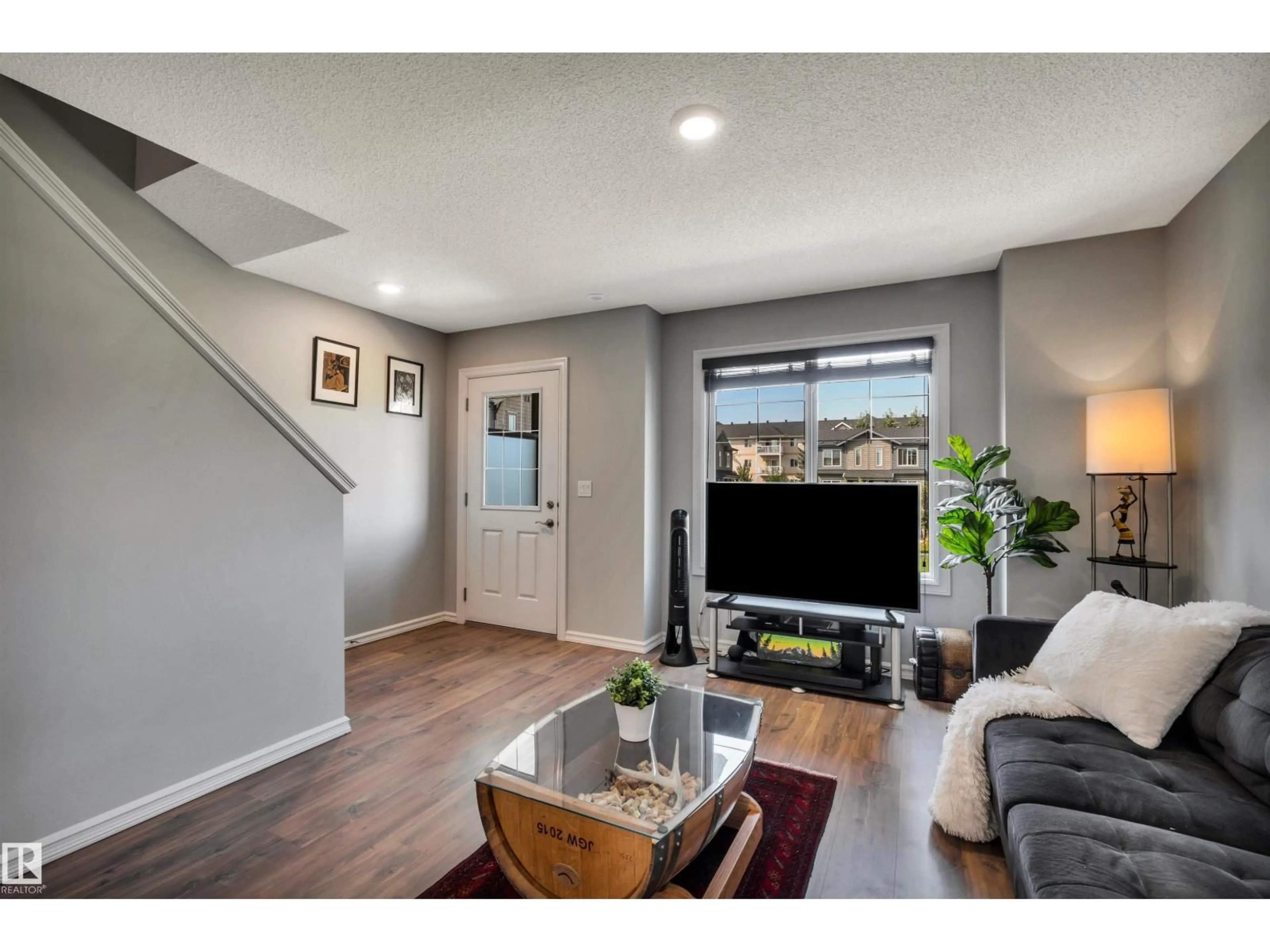 Living room with furniture, unknown for #33 - 3025 151 AV, Edmonton Alberta T5Y3W4