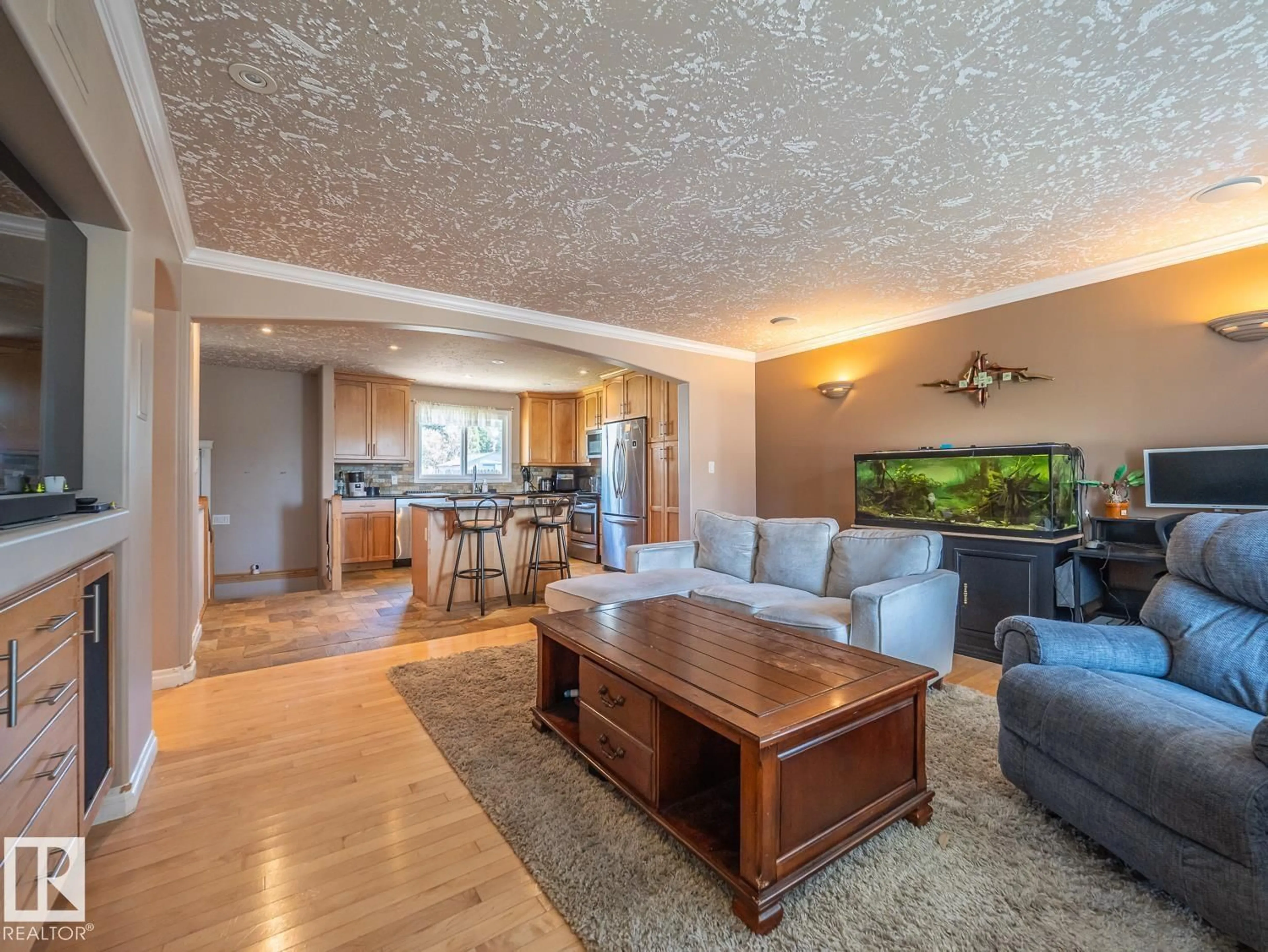 Living room with furniture, wood/laminate floor for N - 5337 47 ST, Bruderheim Alberta T0B0S0