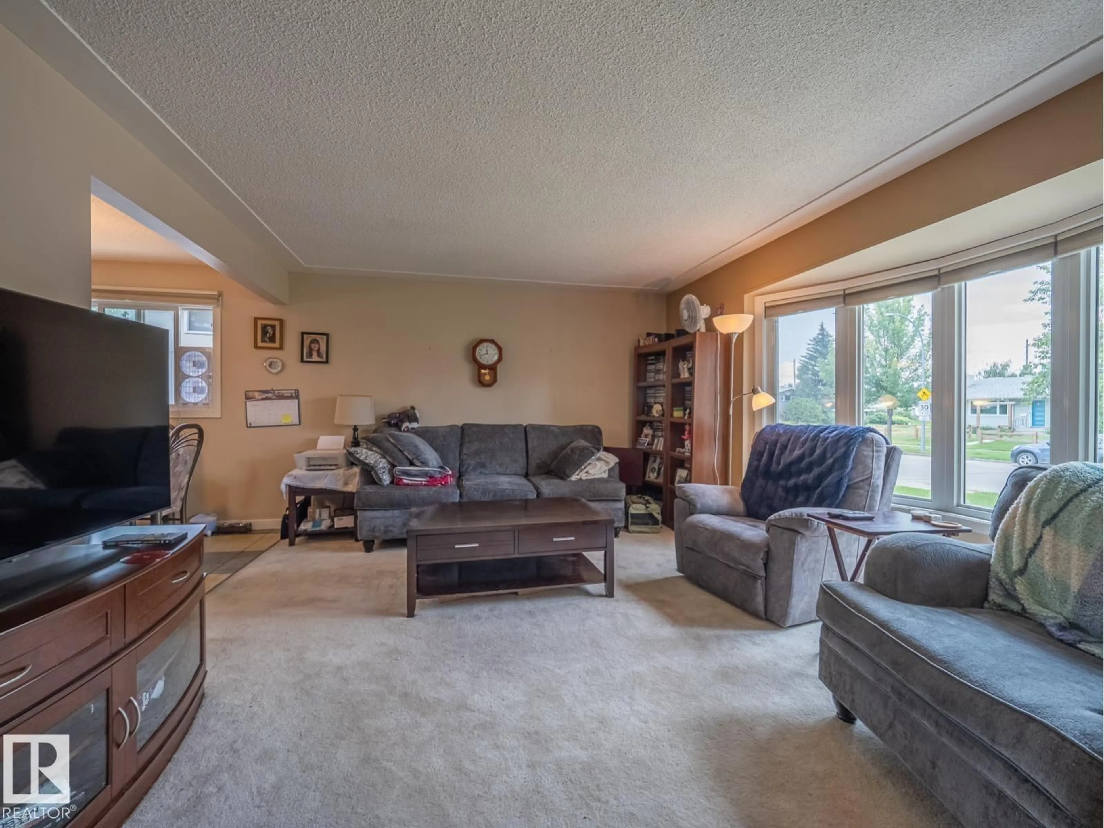 Living room with furniture, unknown for NW - 16706 80 AV, Edmonton Alberta T5R3N2