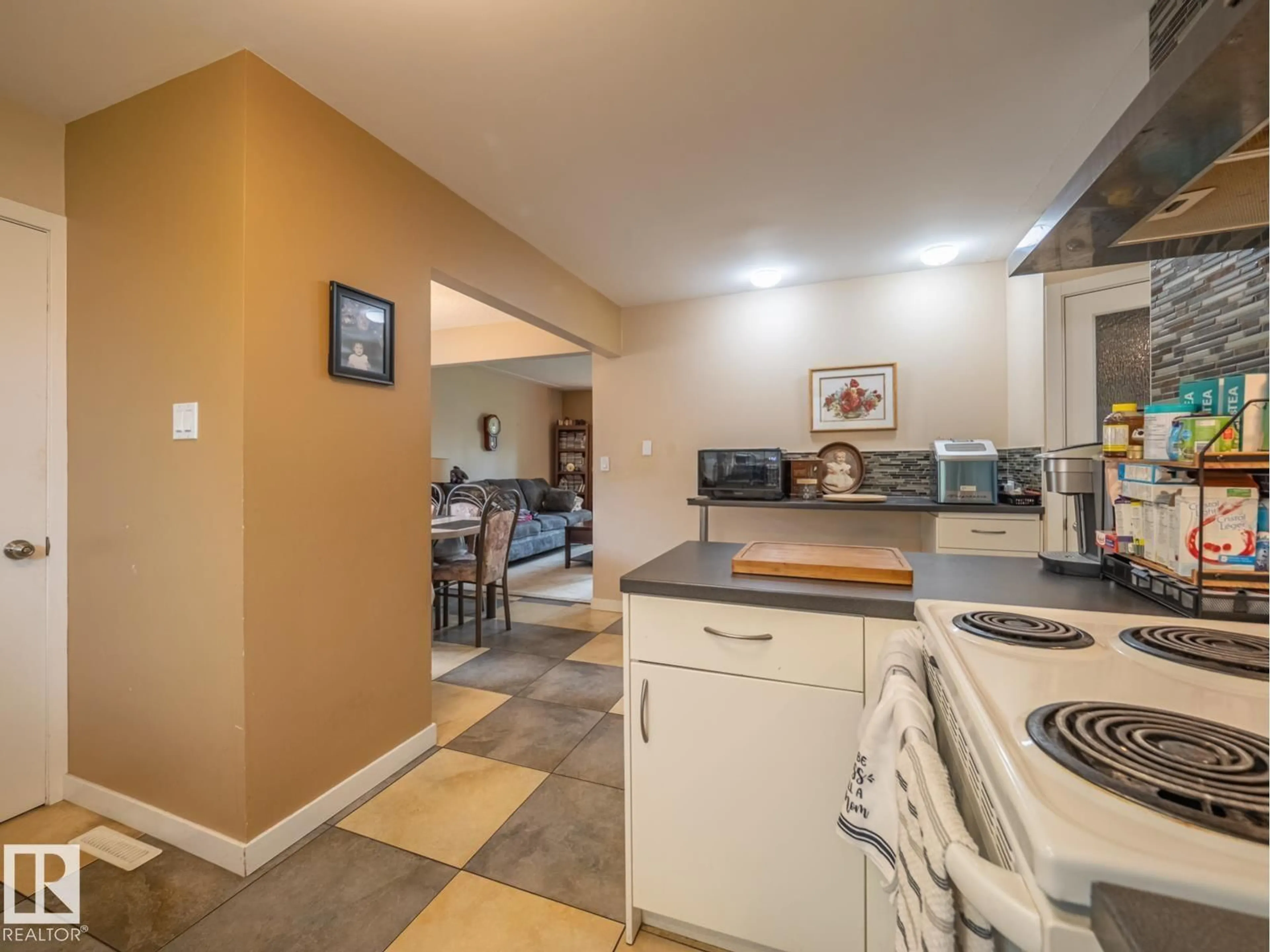 Open concept kitchen, ceramic/tile floor for NW - 16706 80 AV, Edmonton Alberta T5R3N2