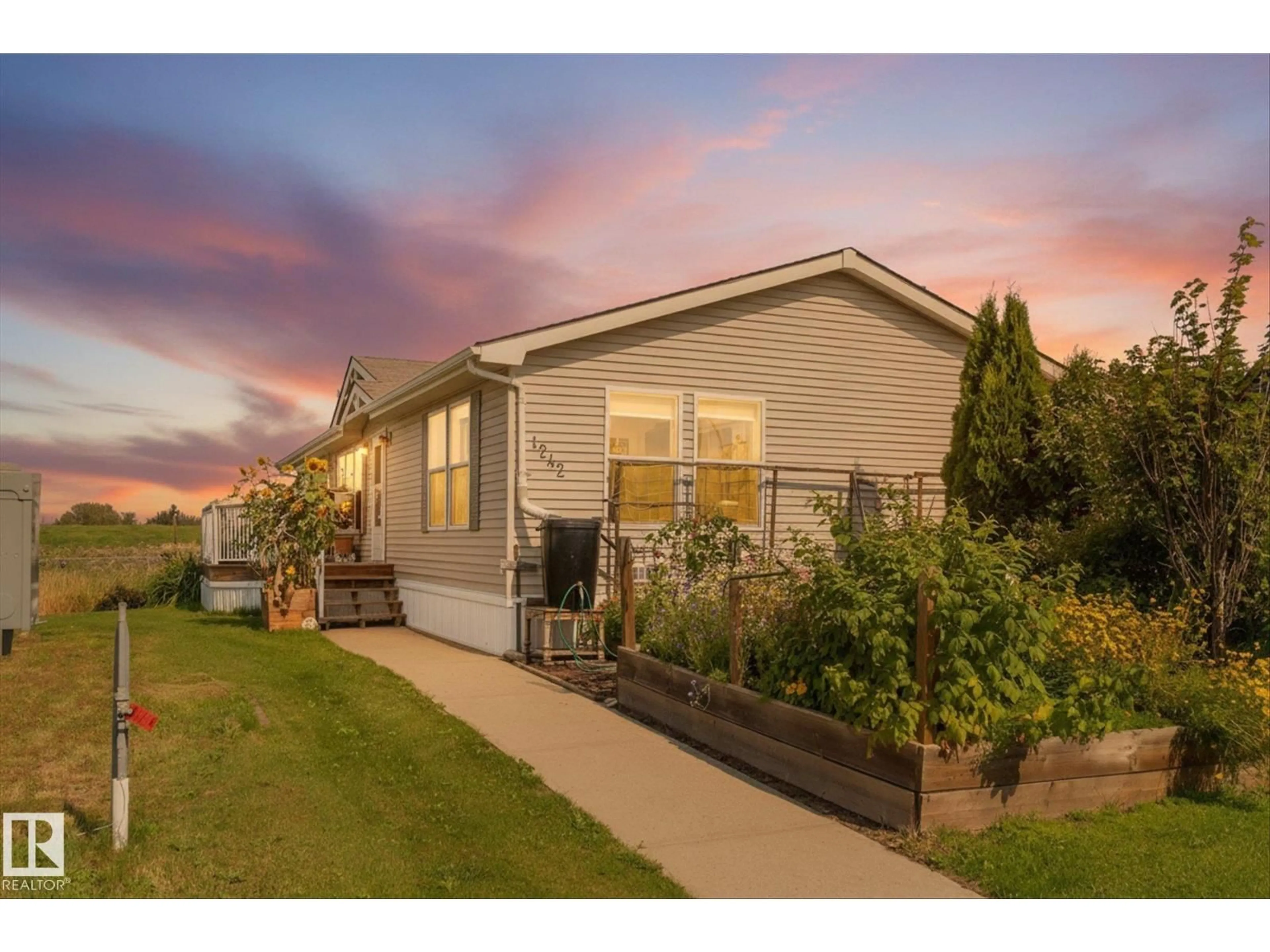 Home with vinyl exterior material, street for 53222 - 1242 RANGE ROAD 272, Rural Parkland County Alberta T7X4K4