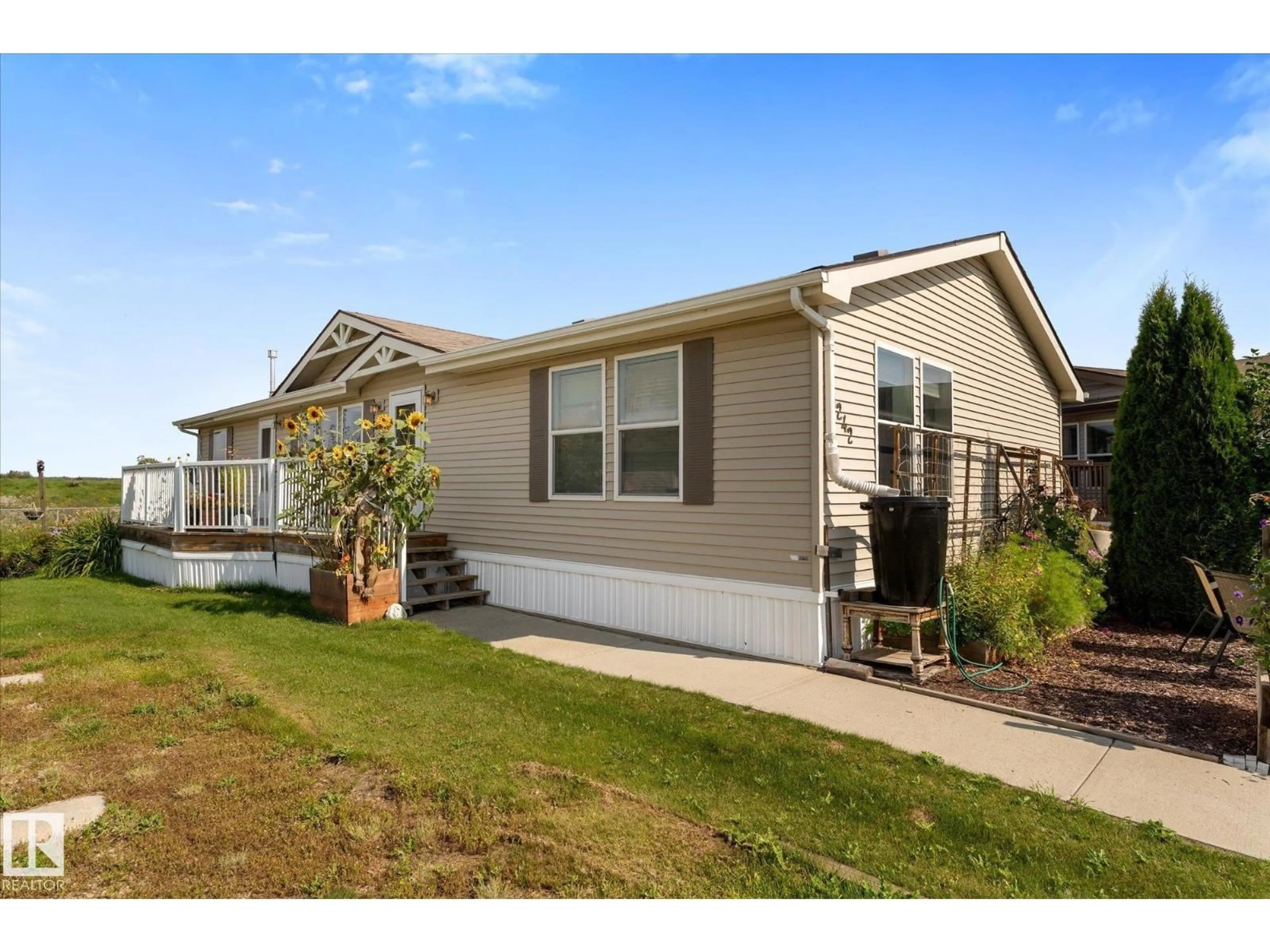 Home with vinyl exterior material, street for 53222 - 1242 RANGE ROAD 272, Rural Parkland County Alberta T7X4K4
