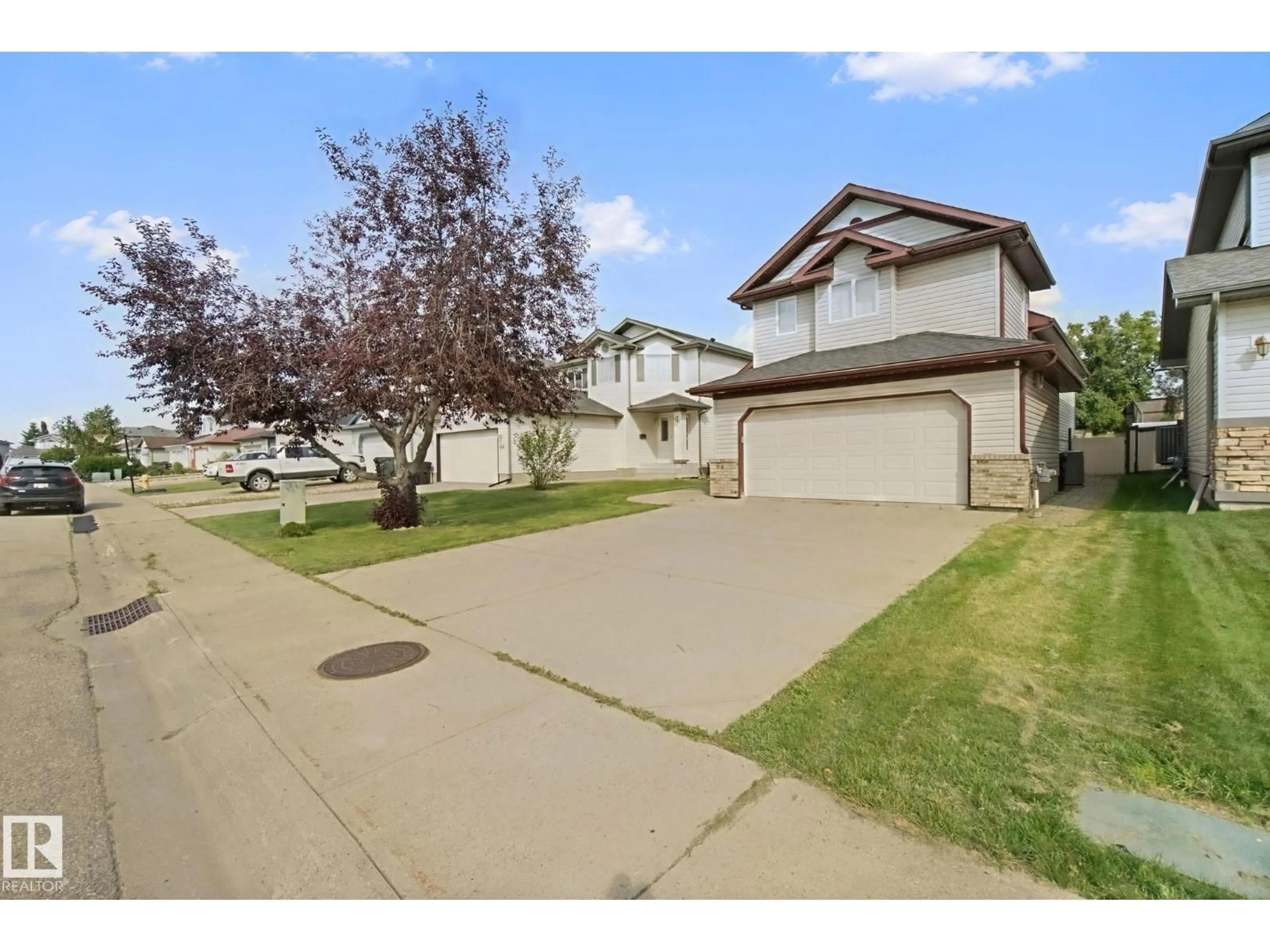 A pic from outside/outdoor area/front of a property/back of a property/a pic from drone, street for 64 ORCHID CR, Sherwood Park Alberta T8H2E4