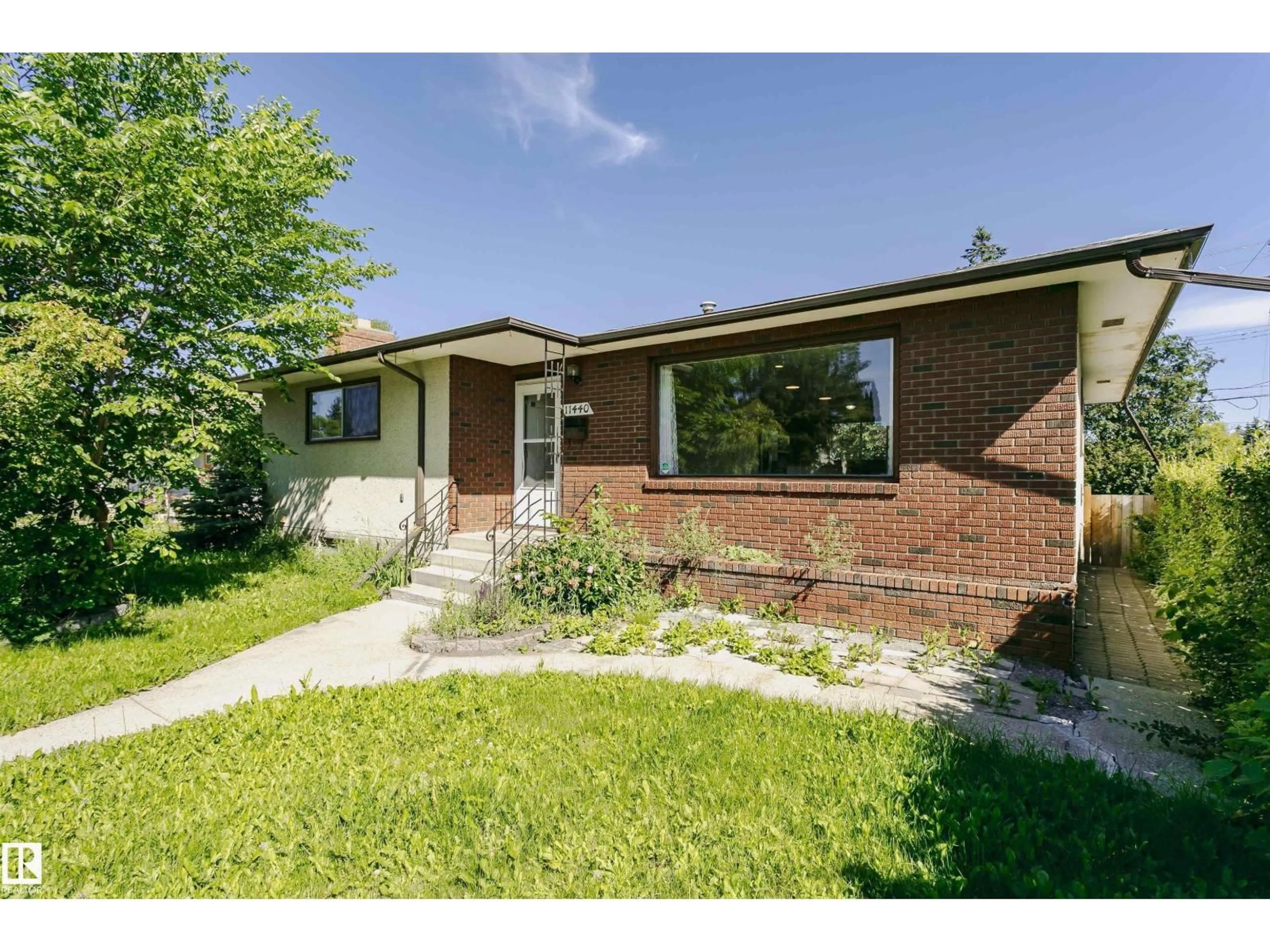 Home with brick exterior material, street for 11440 44A AV, Edmonton Alberta T6J0Z9