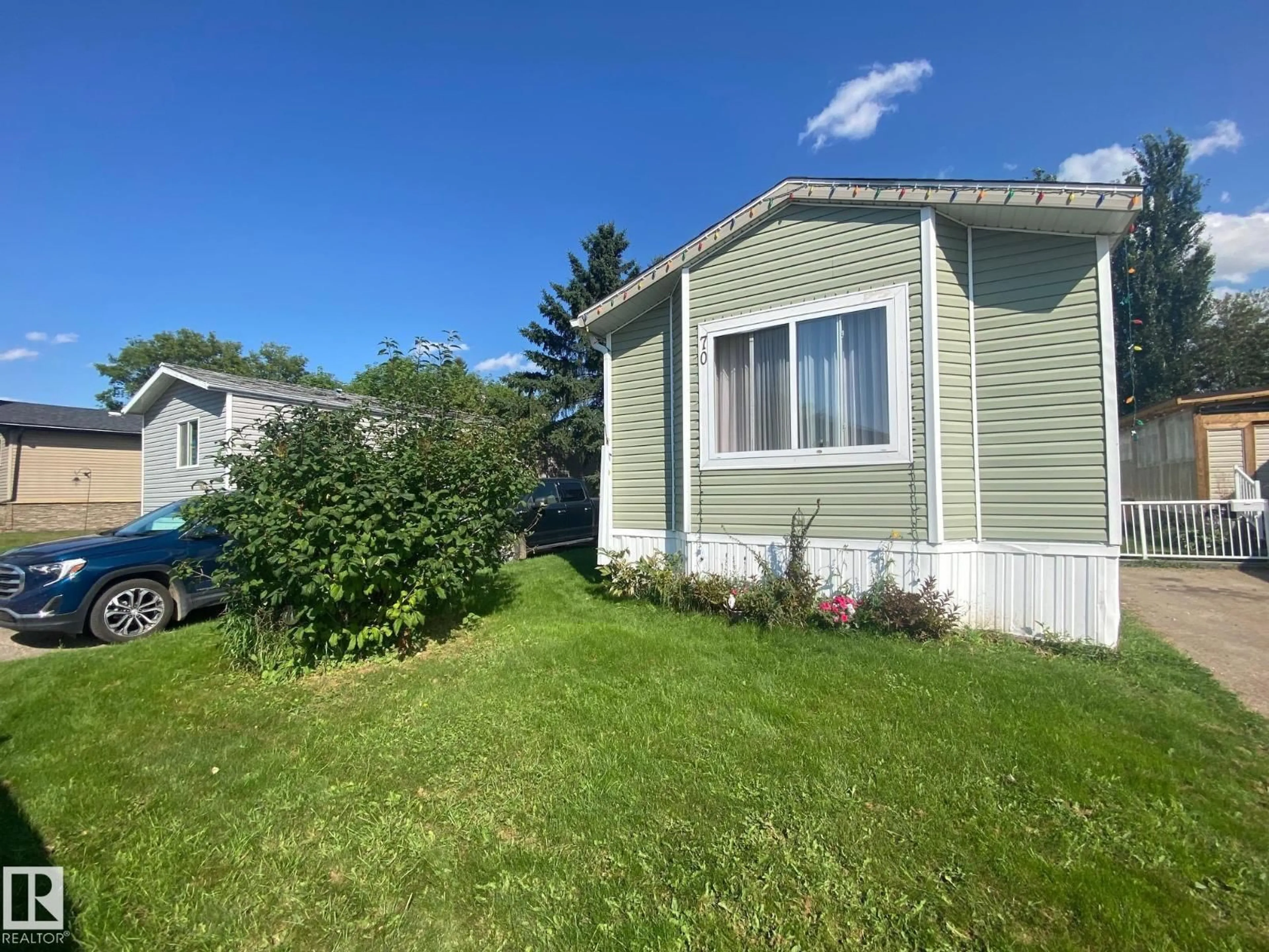 Home with vinyl exterior material, unknown for 70 4202 45 ST, Wetaskiwin Alberta T9A2L3
