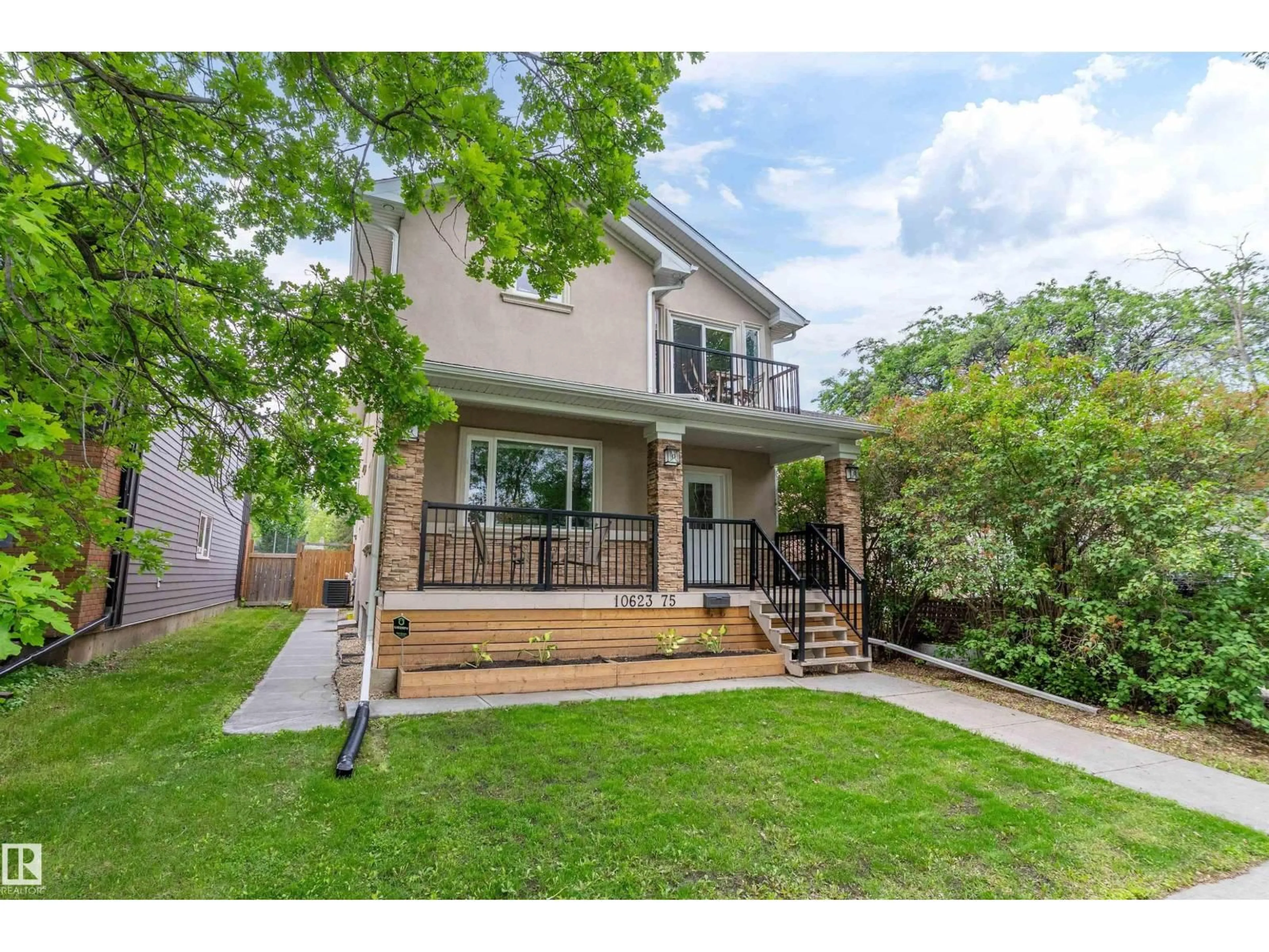 Home with brick exterior material, street for 10623 75 AV, Edmonton Alberta T6E1J6