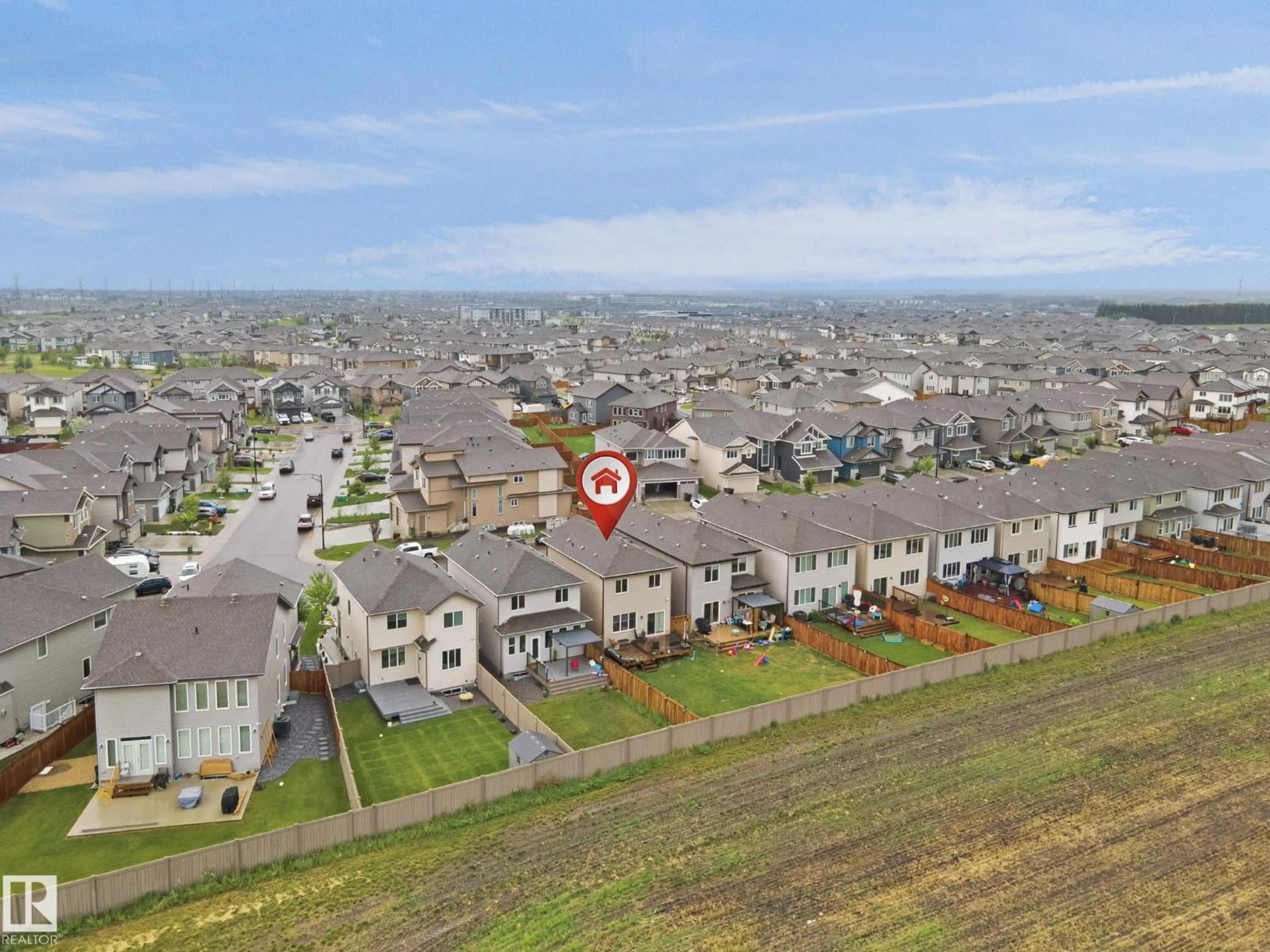 A pic from outside/outdoor area/front of a property/back of a property/a pic from drone, mountain view for NW - 2551 12 AV, Edmonton Alberta T6T2M6