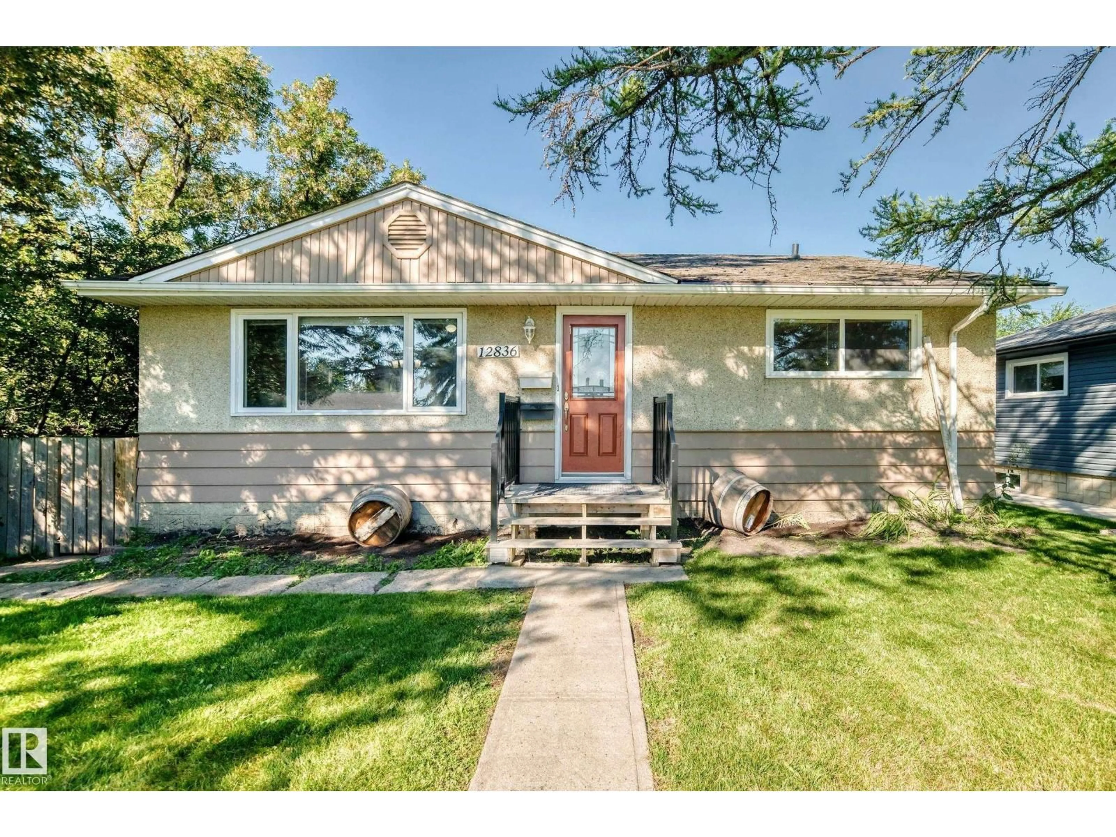 Home with vinyl exterior material, street for NW - 12836 88 ST, Edmonton Alberta T5E3H3