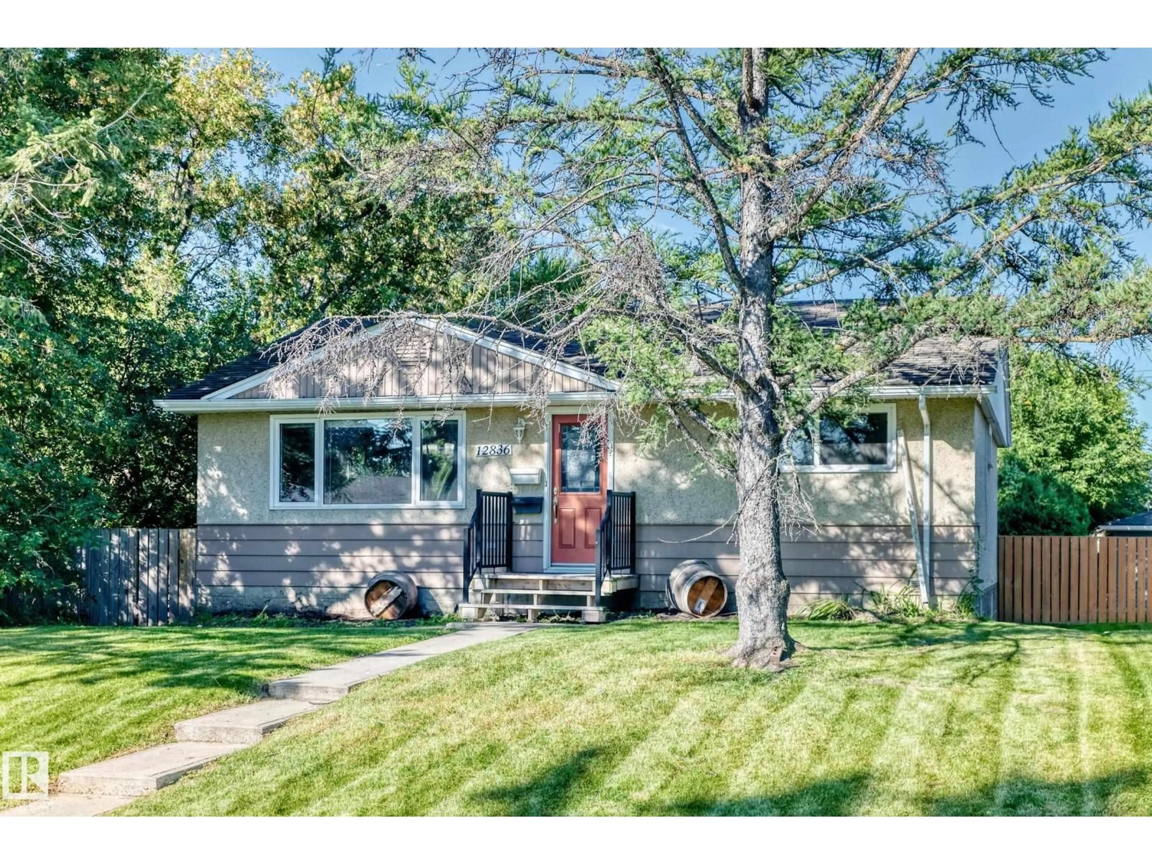 Home with vinyl exterior material, street for NW - 12836 88 ST, Edmonton Alberta T5E3H3