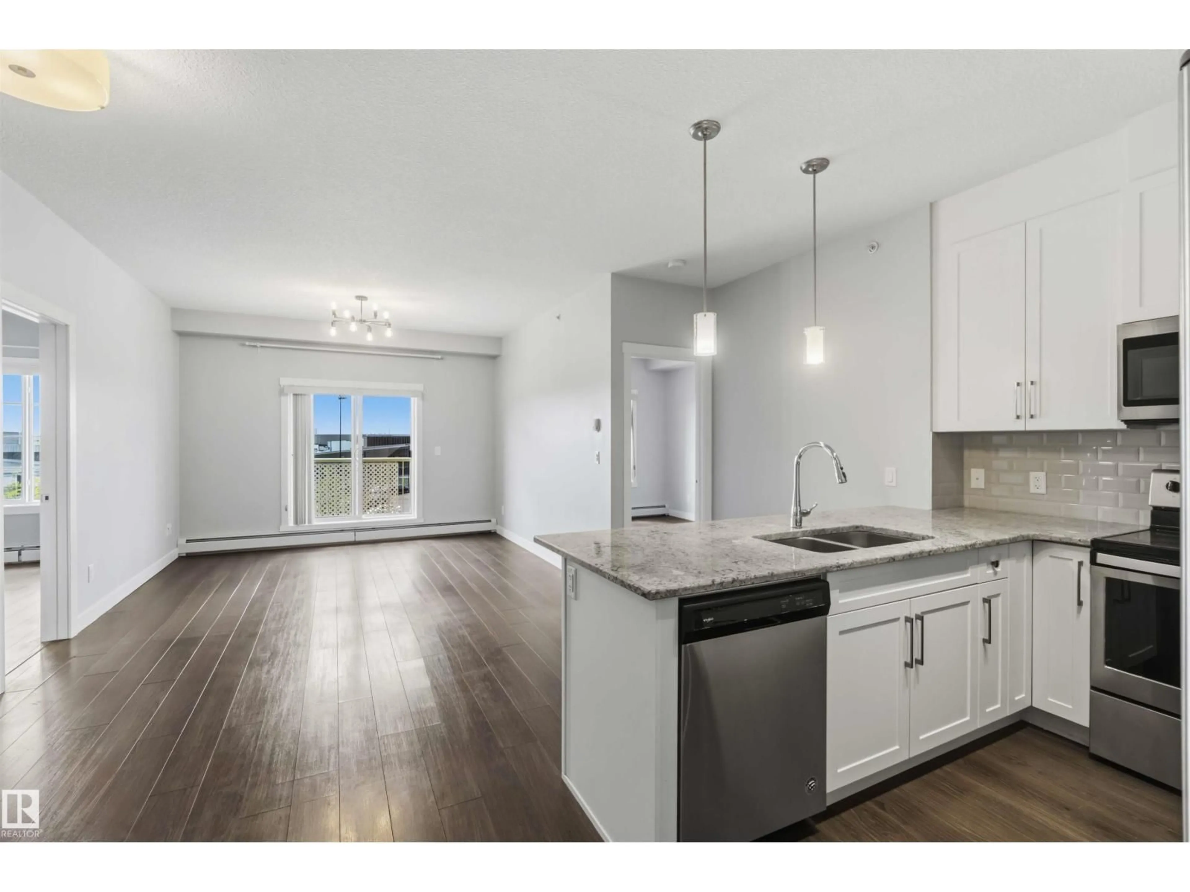 Open concept kitchen, unknown for 411 - 3670 139 AV NW, Edmonton Alberta T5Y3N5
