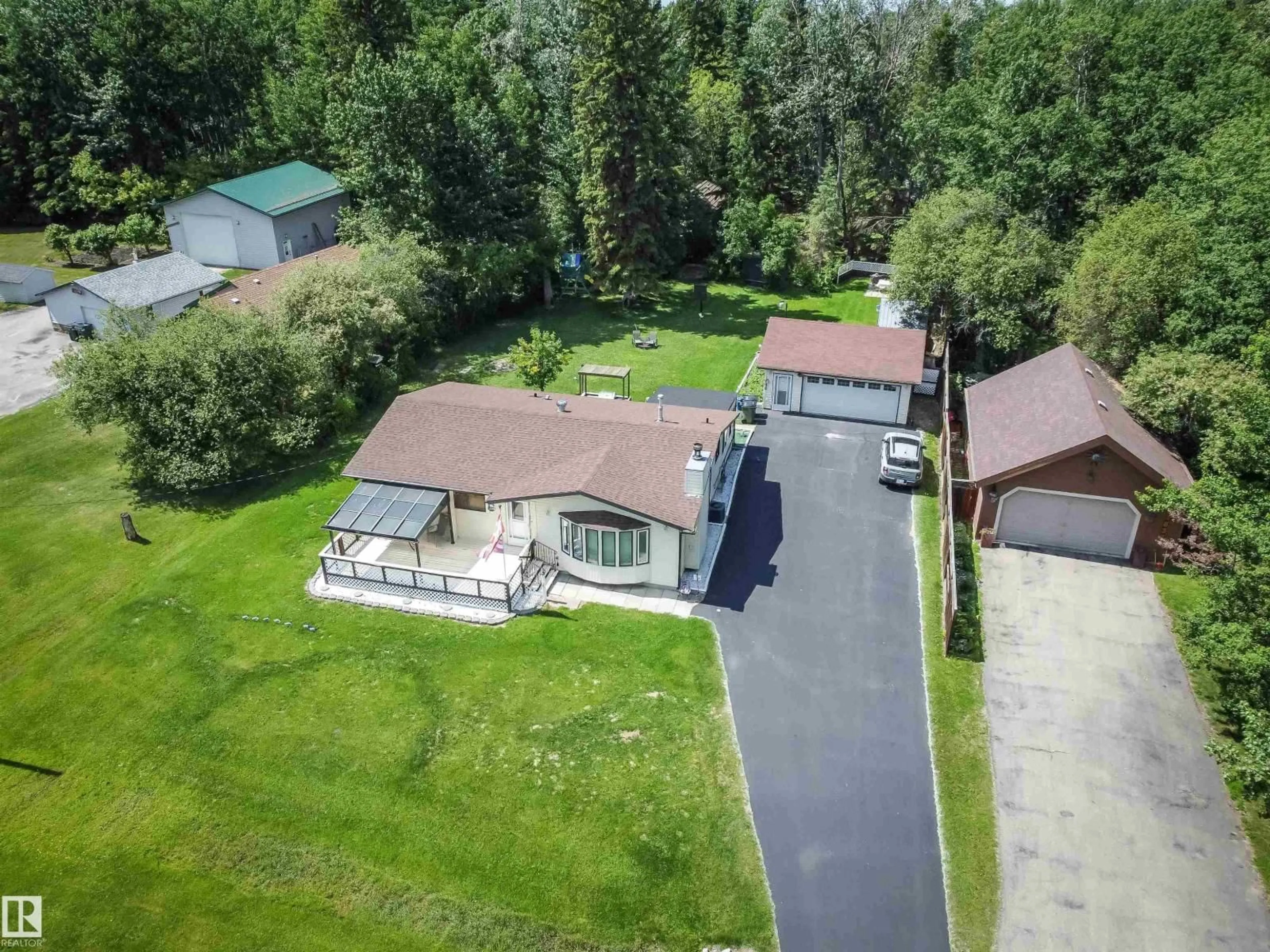 A pic from outside/outdoor area/front of a property/back of a property/a pic from drone, street for 4828 48 ST, Rural Lac Ste. Anne County Alberta T0E0A0
