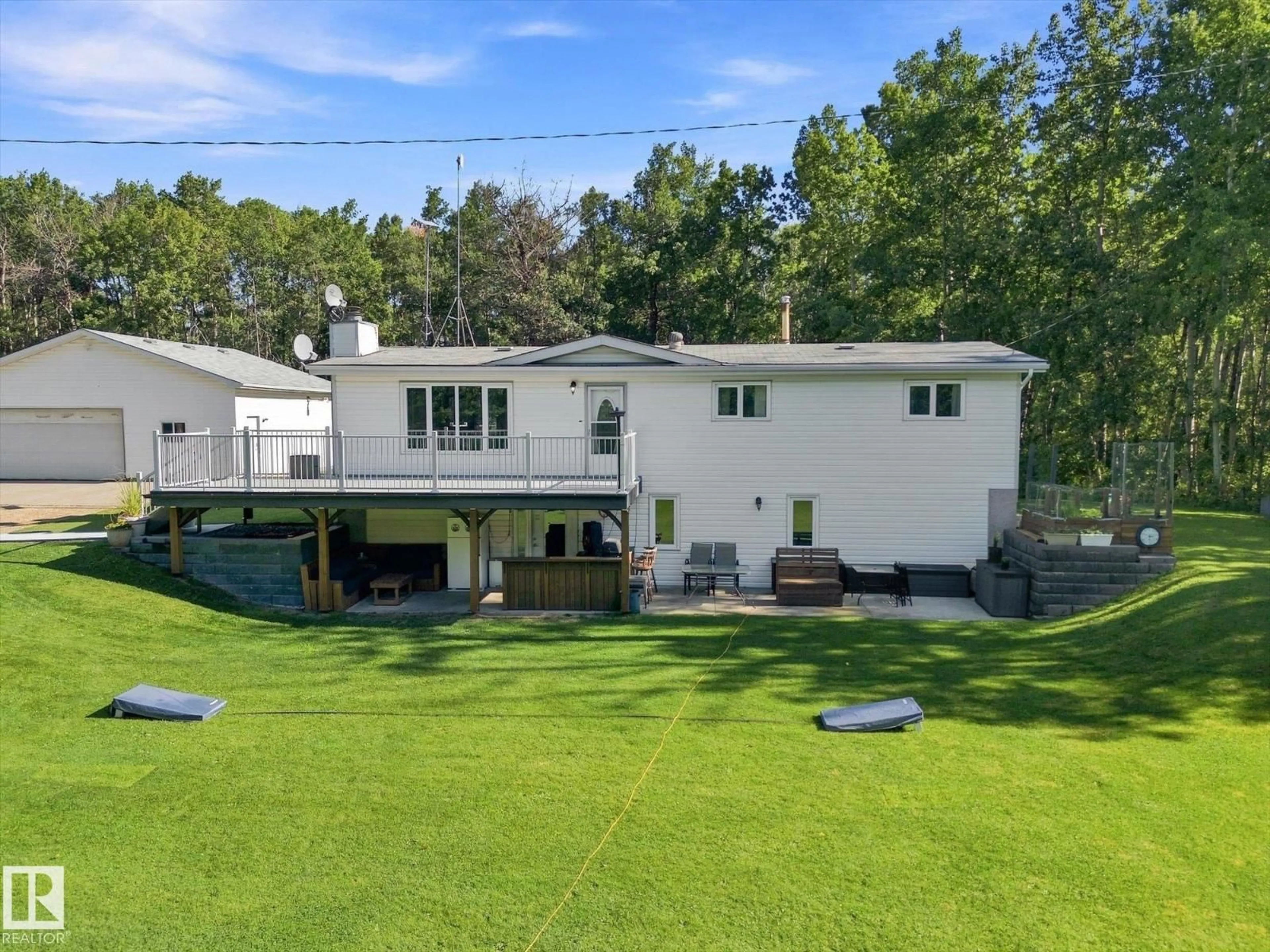 A pic from outside/outdoor area/front of a property/back of a property/a pic from drone, unknown for #17 - 54014 RGE ROAD 275, Rural Parkland County Alberta T7X3V4